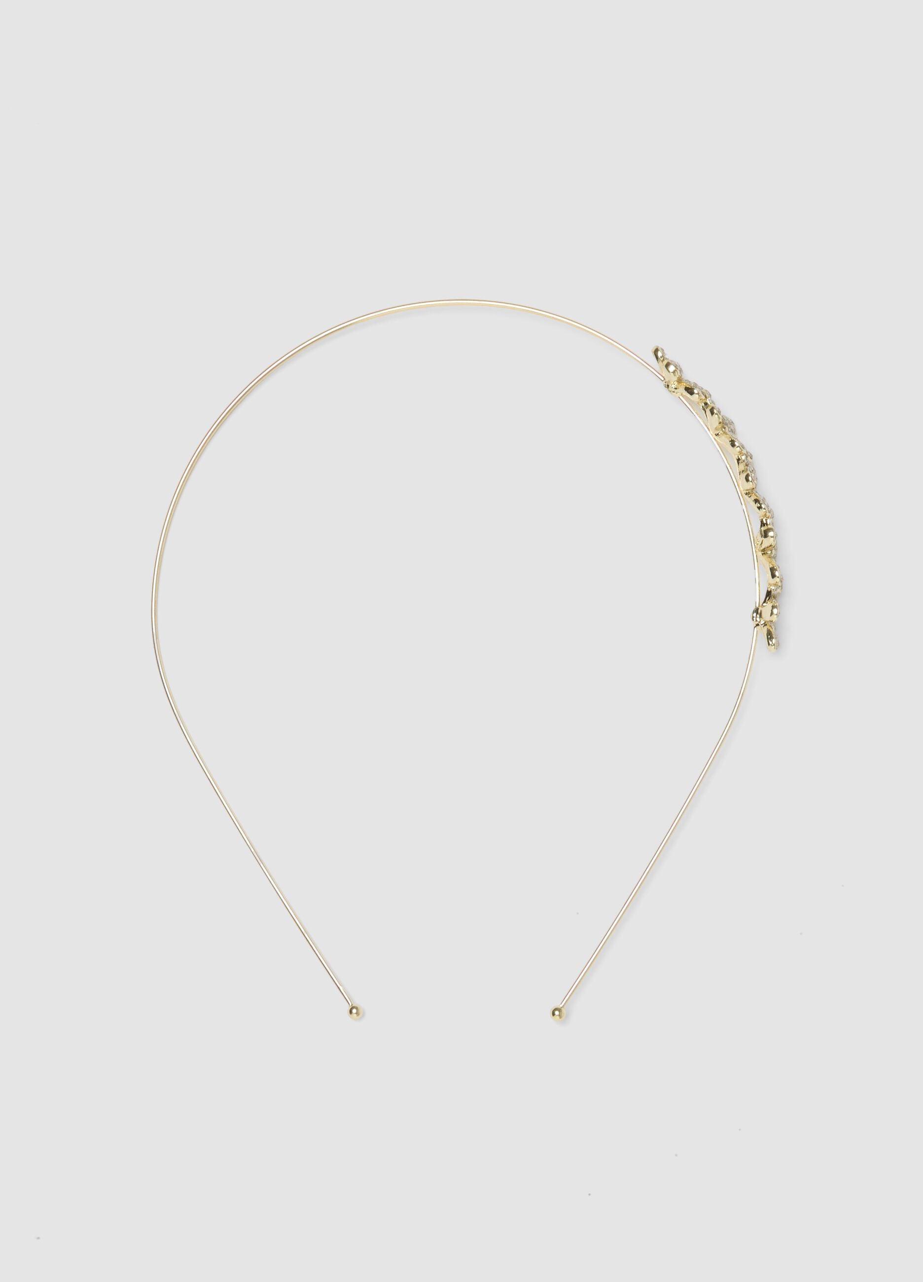 Golden girl's headband with floral decoration