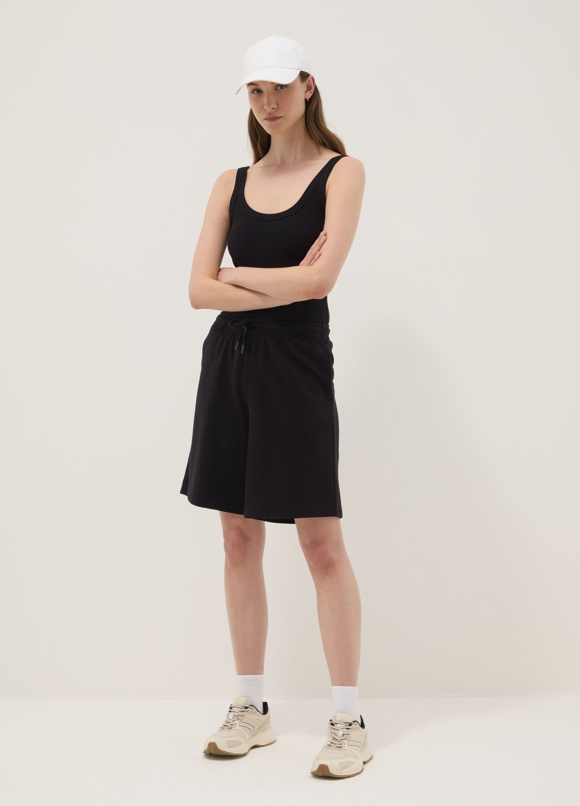 Black ribbed stretch-cotton bodysuit with wide neckline