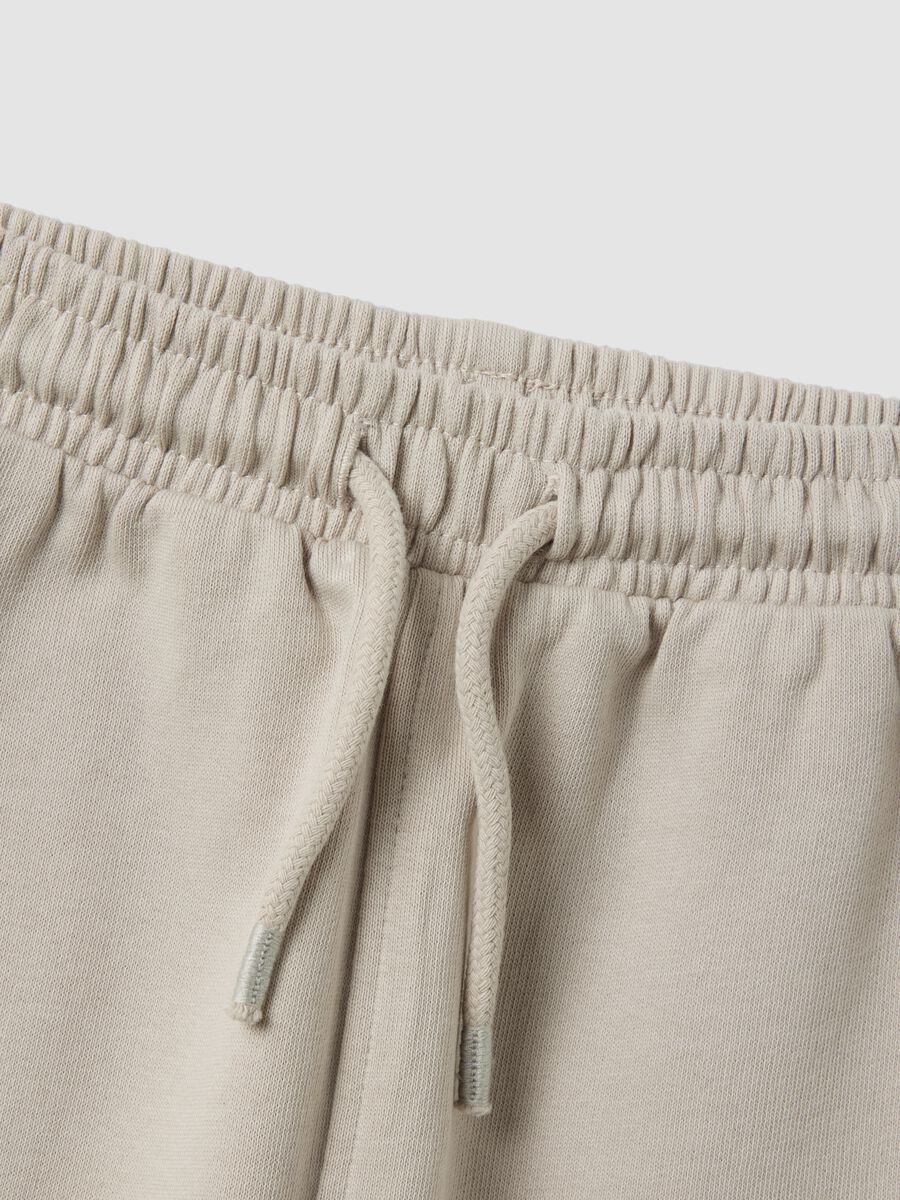 Grey jogger trousers in pure organic cotton with drawstring for baby boy_3