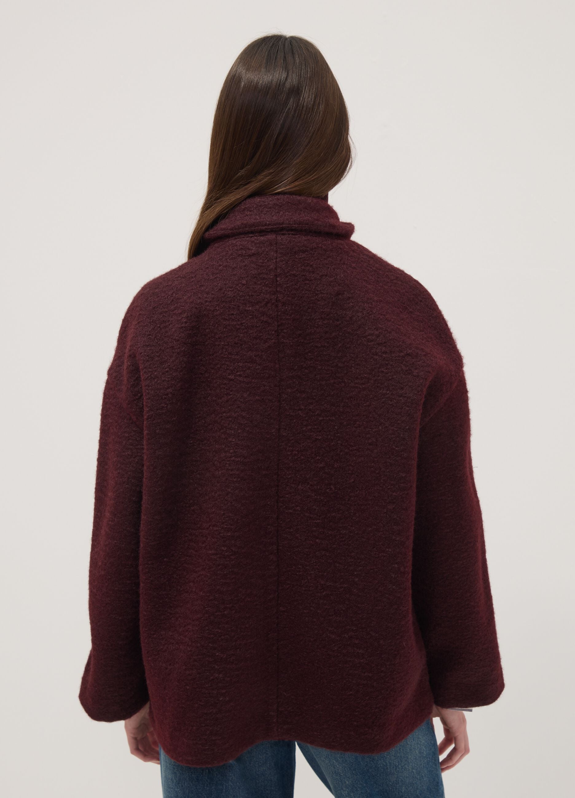 Red jacket with zip and press studs