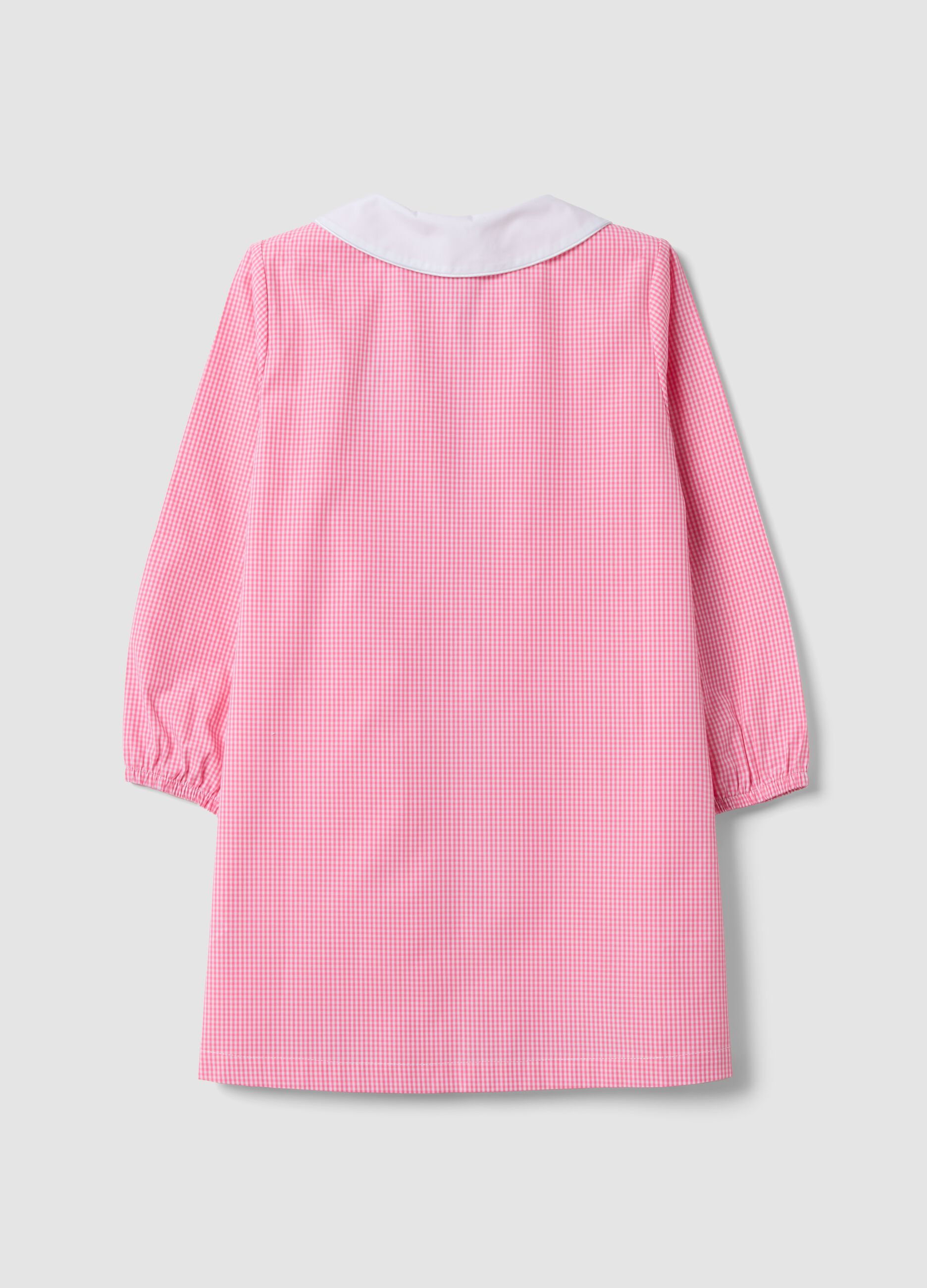 Pink gingham nursery apron with white collar and Minnie embroidery