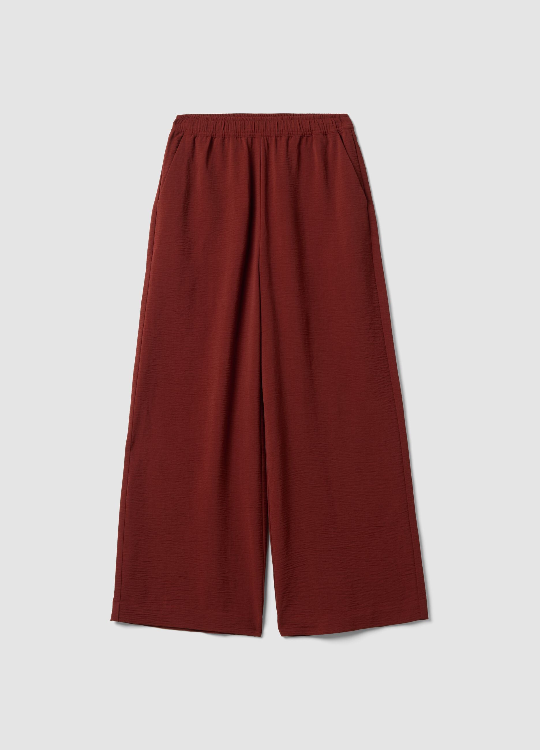 Red wide-leg trousers with elasticated waistband
