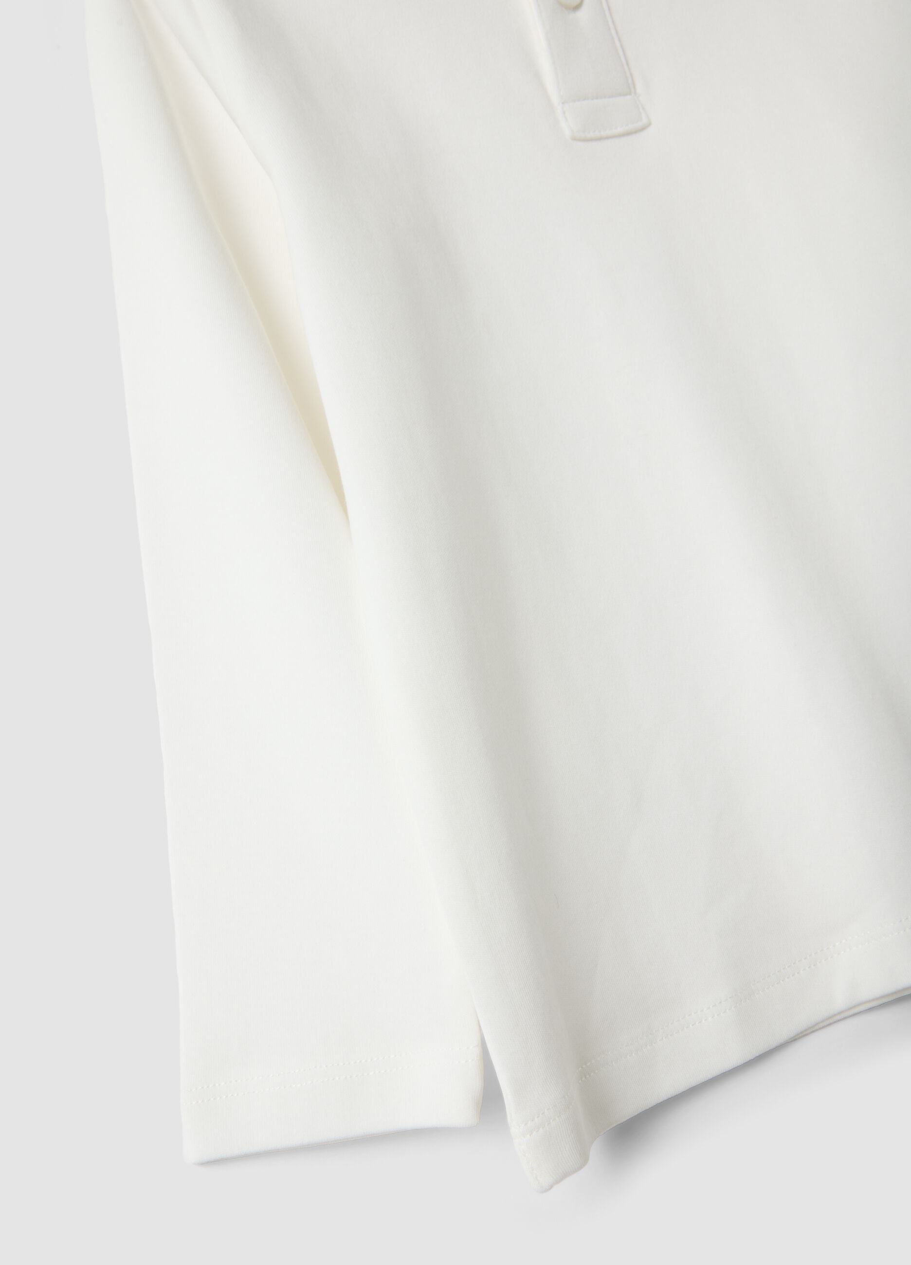 White long-sleeved polo shirt in pure organic cotton