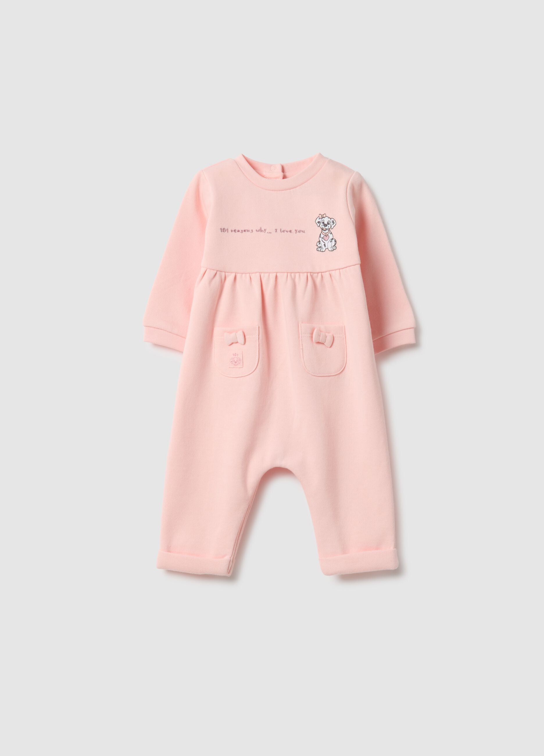 Baby girl's pink cotton sleepsuit with embroidered details
