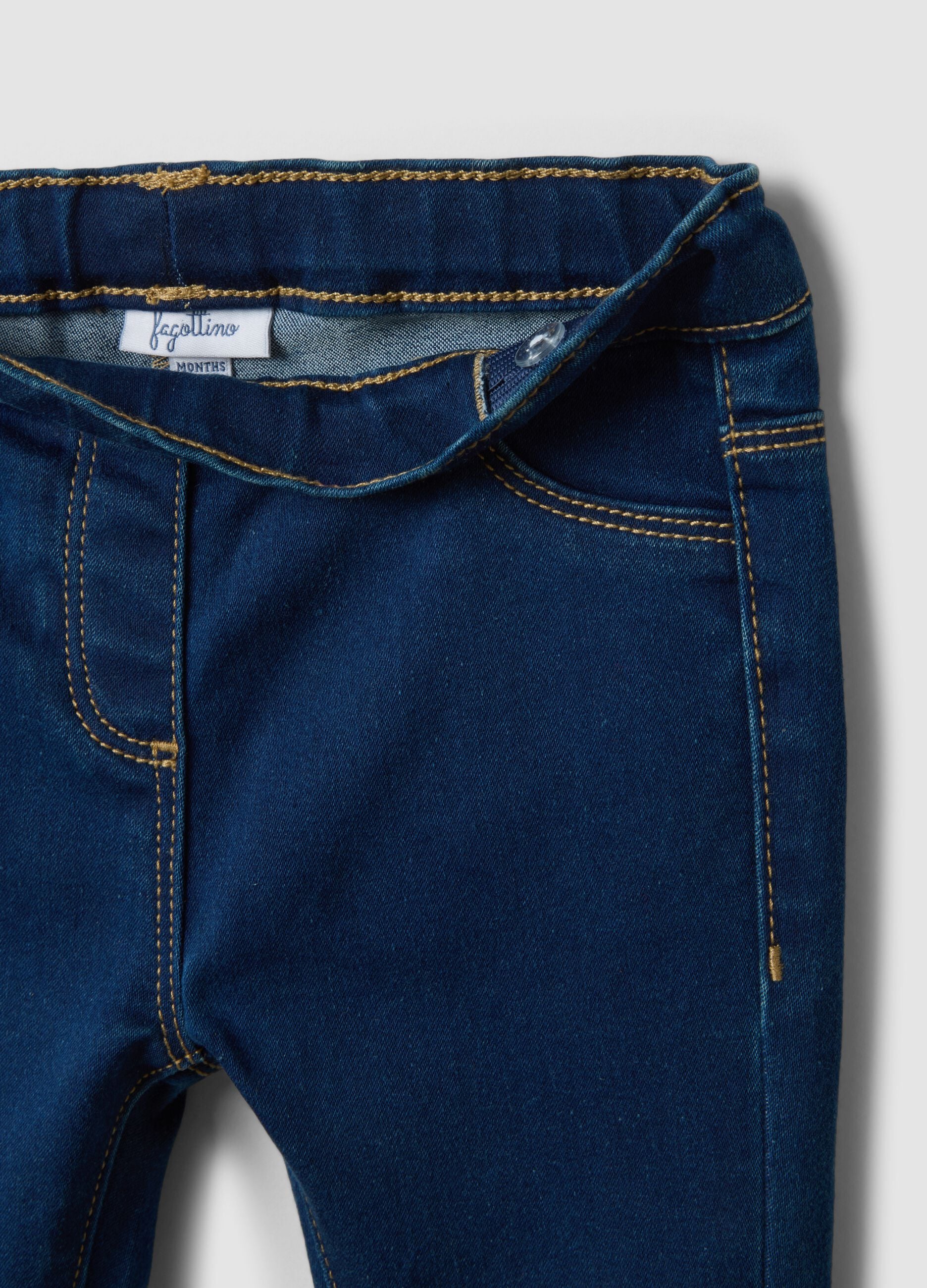 Blue flared stretch-cotton jeggings with glitter for baby girl