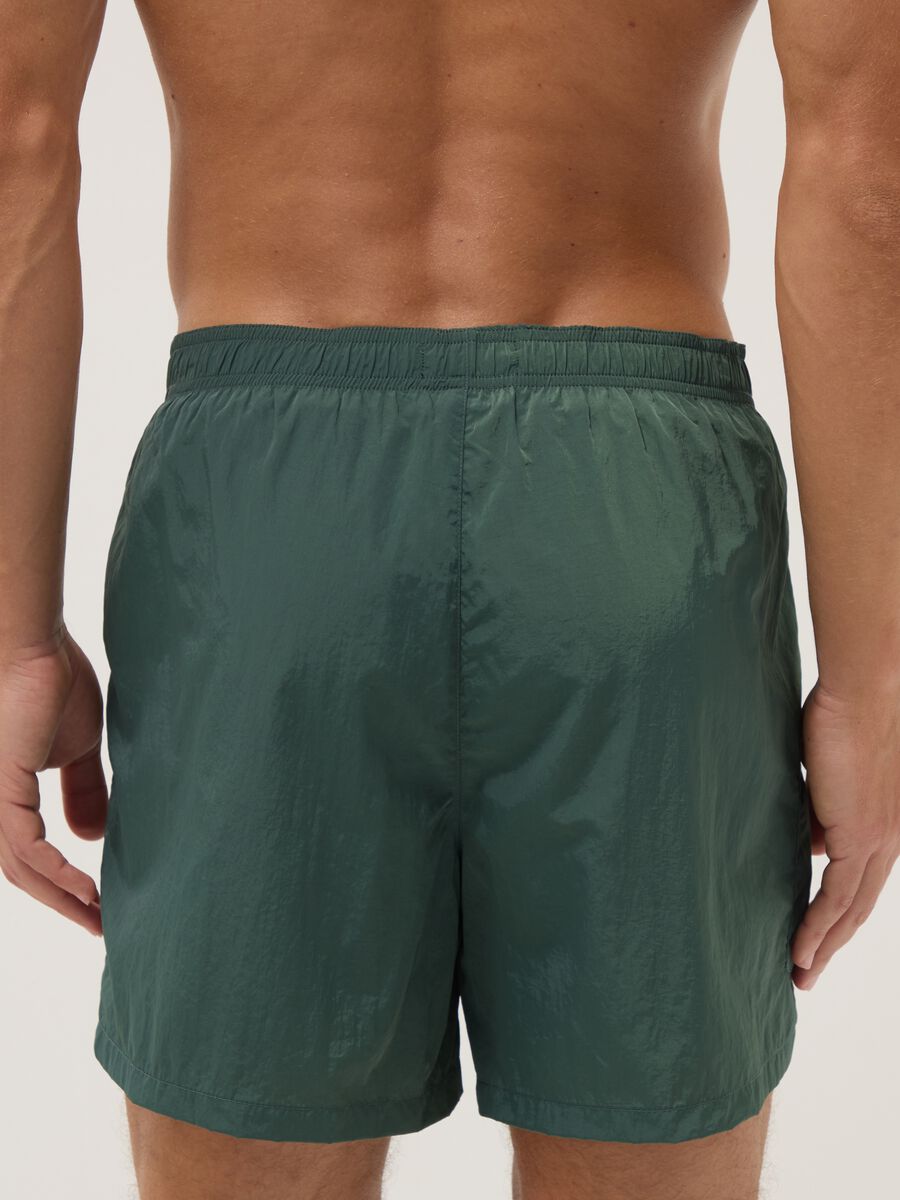 Green swim shorts with elasticated waistband_2