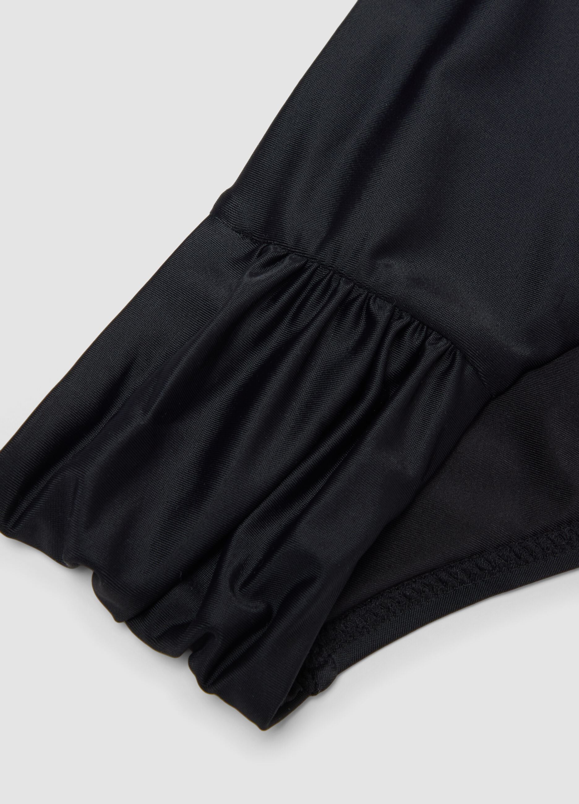 Black stretch swim briefs with side gathers