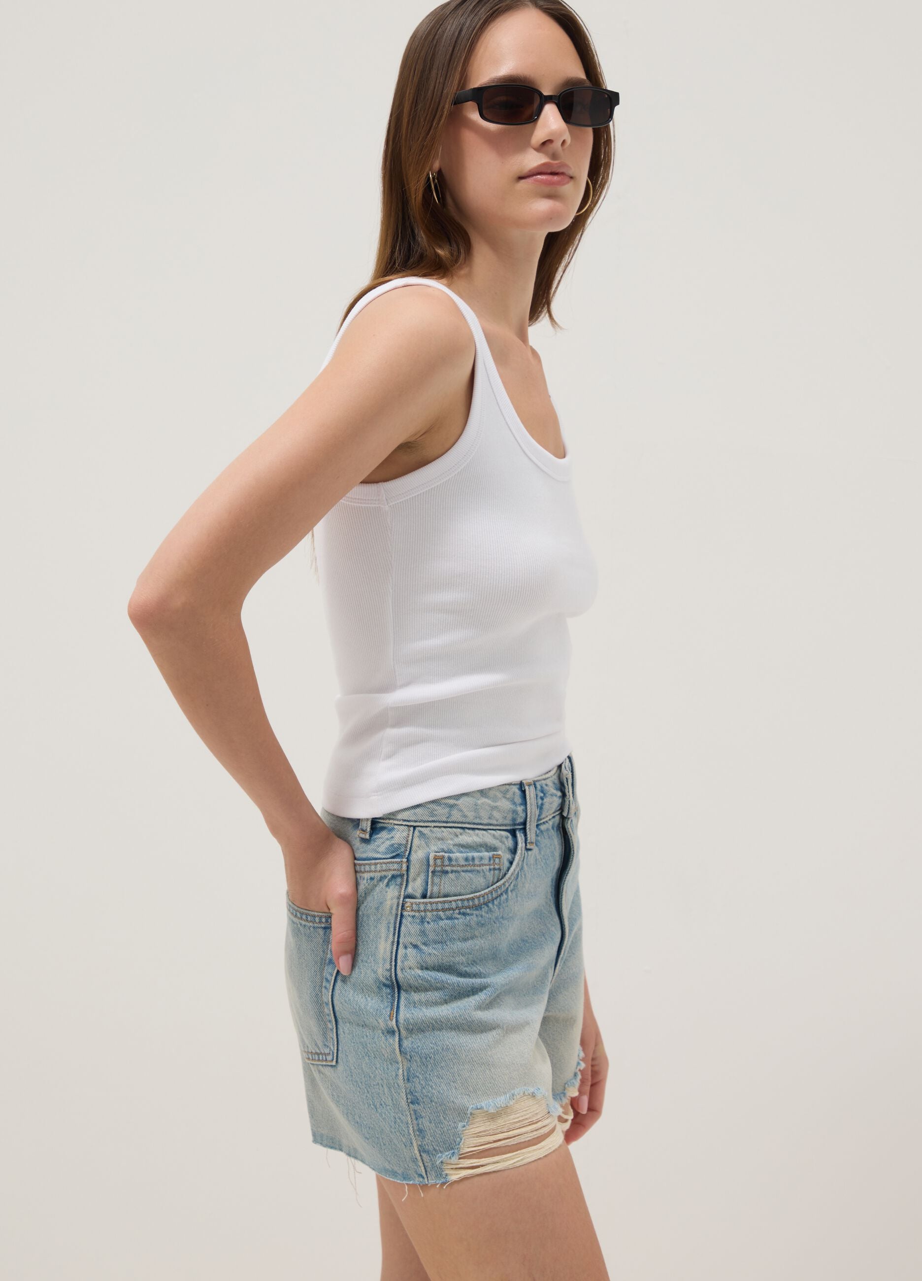 Light blue pure cotton denim shorts with frayed hems