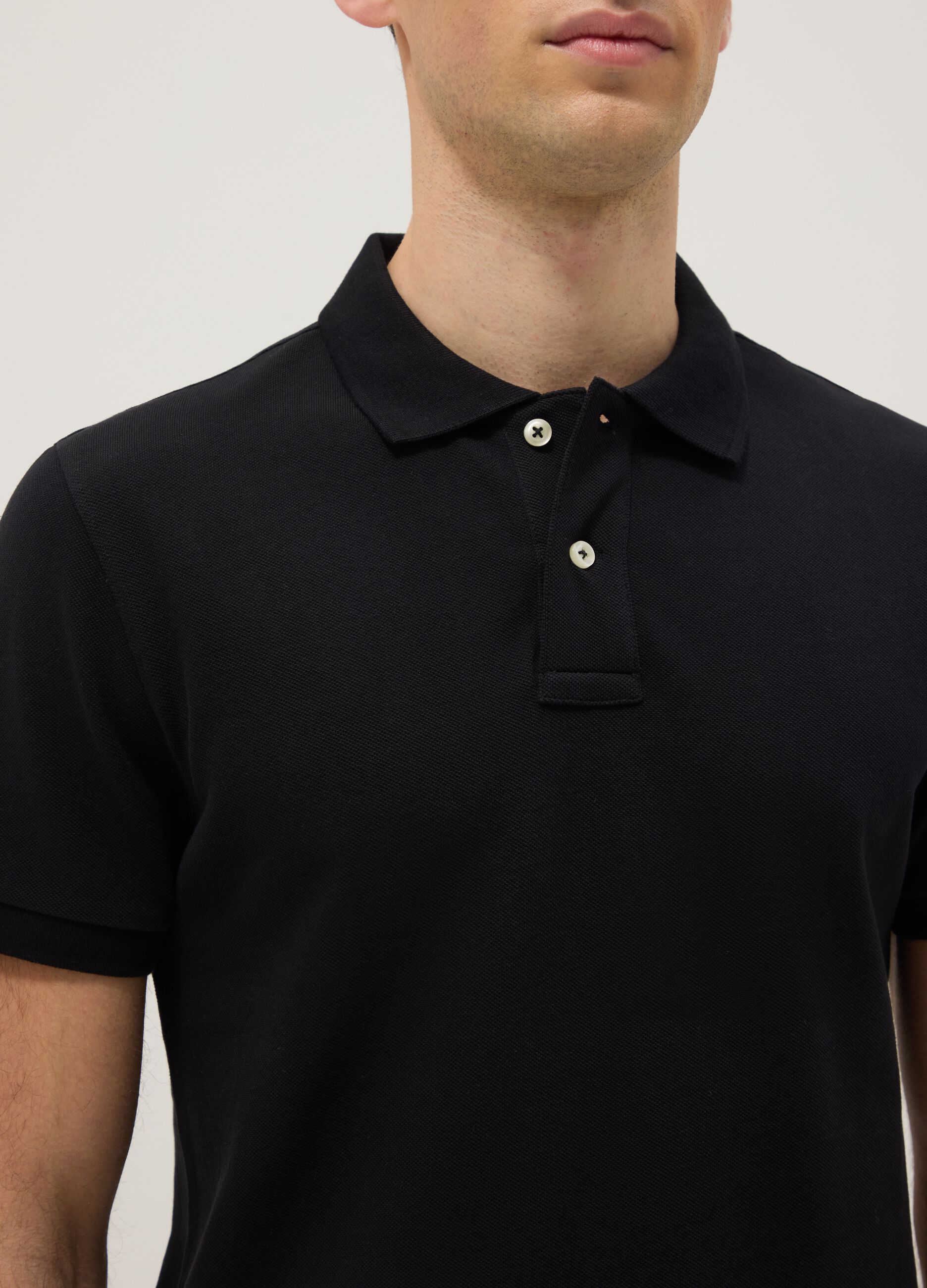 Short sleeve black organic cotton polo shirt, slim fit