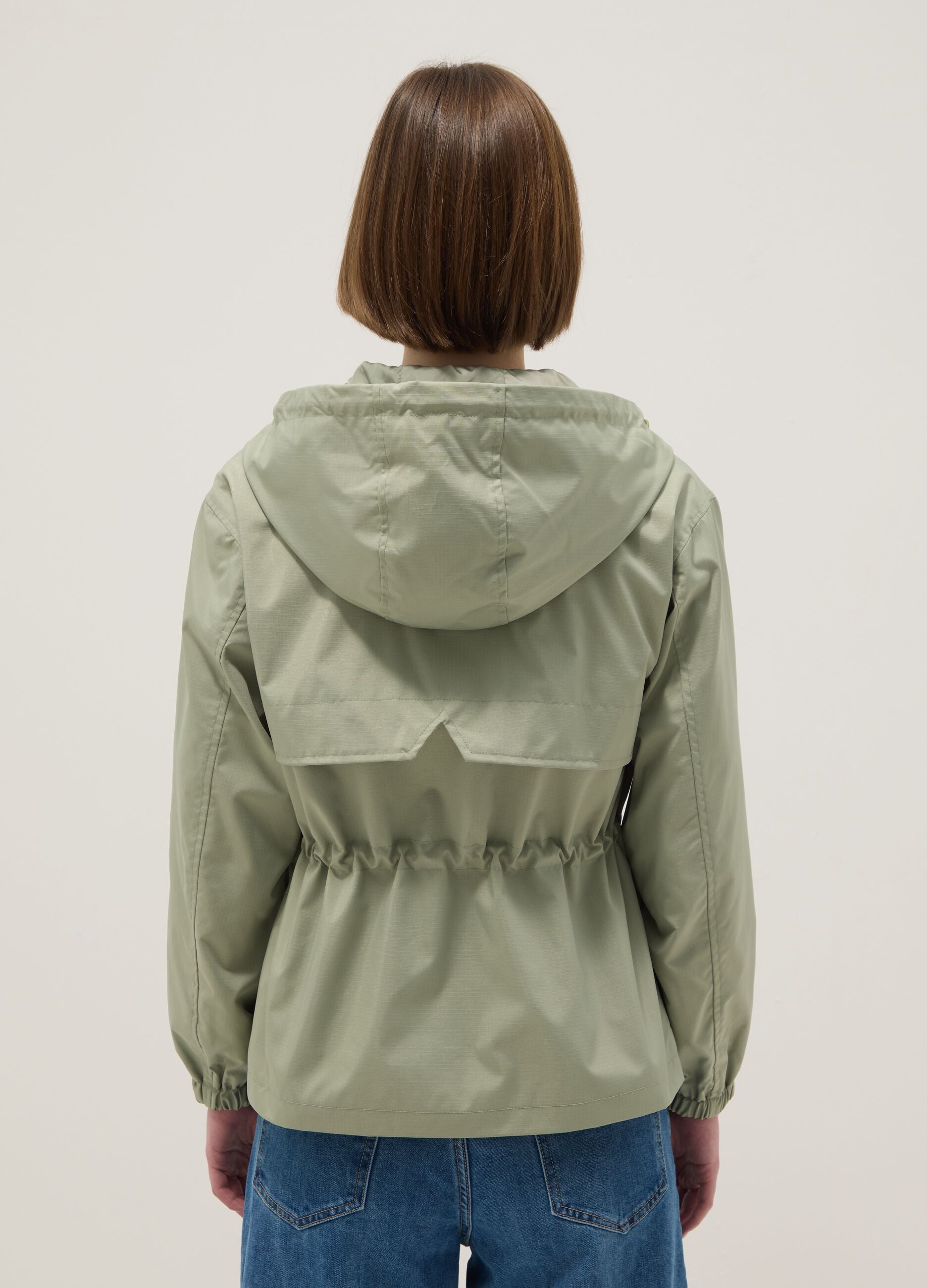 Green waterproof jacket with regular fit, pockets and hood