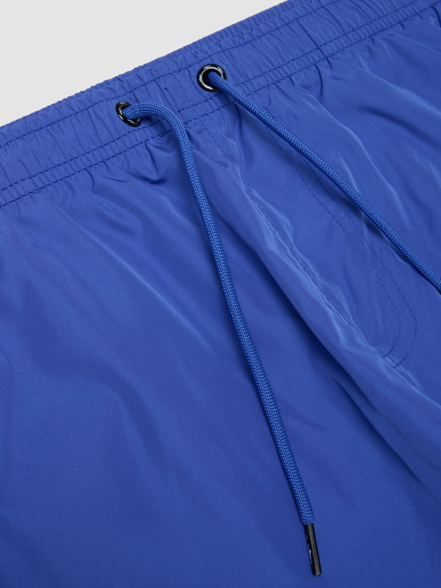 Blue swim shorts with elasticated waistband and drawstring_5