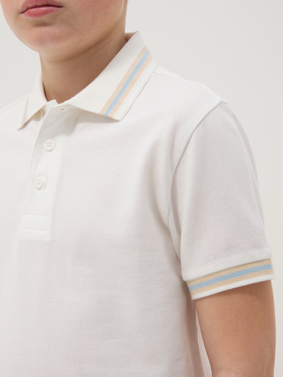 Polo in puro cotone bianca da ragazzo regular fit_1