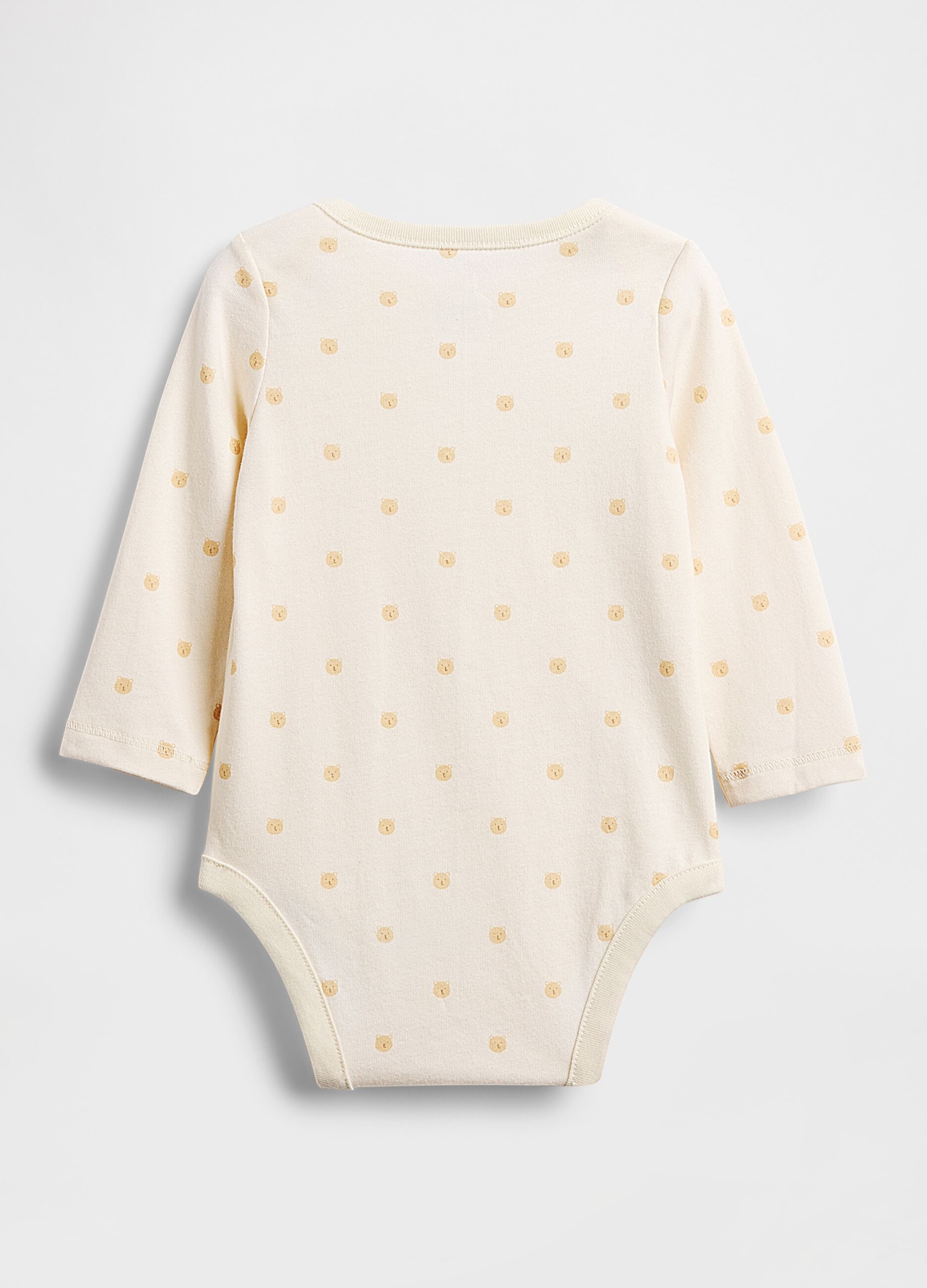 White cotton bodysuit with polka dots