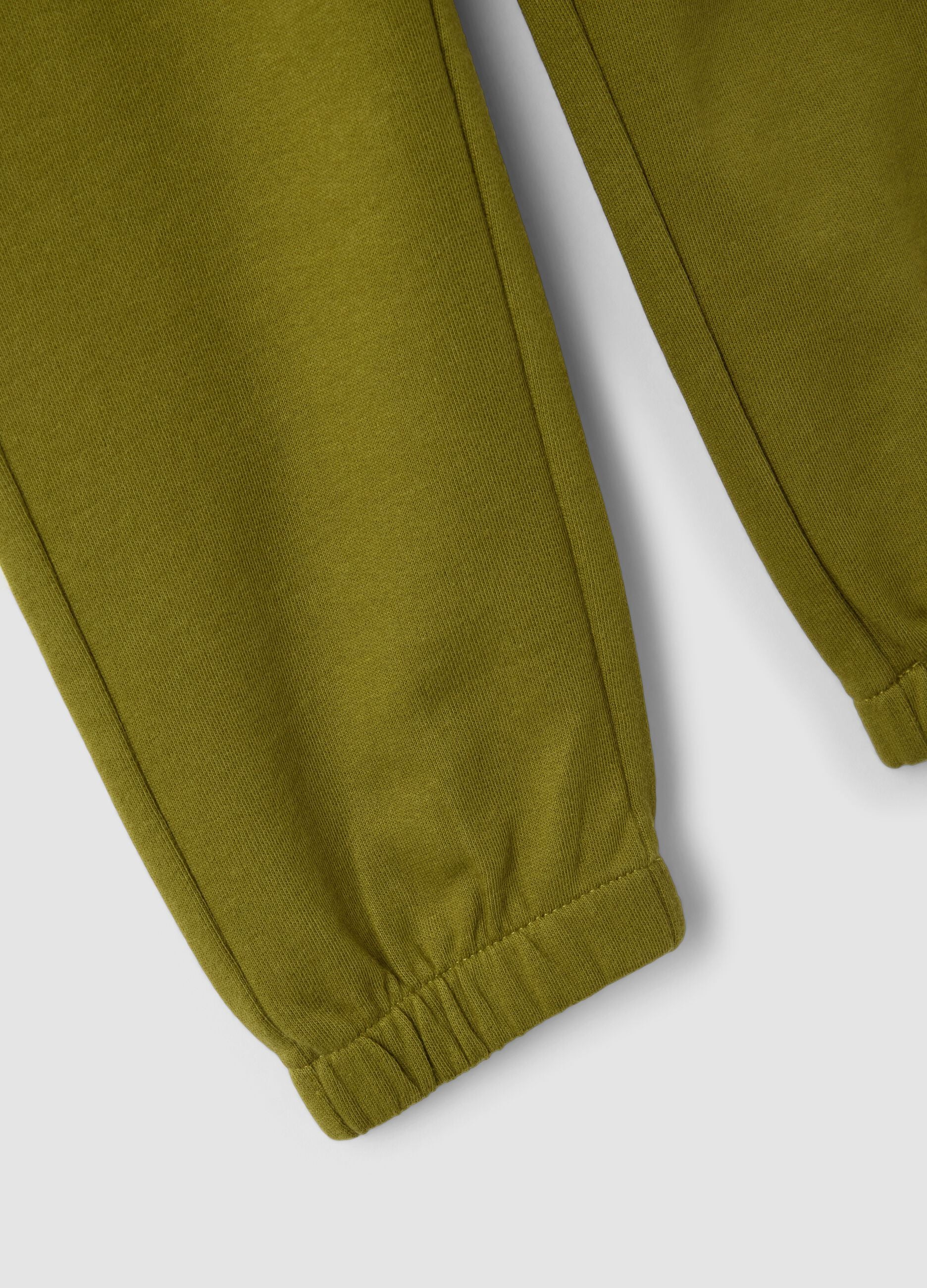 Green organic cotton jogger trousers