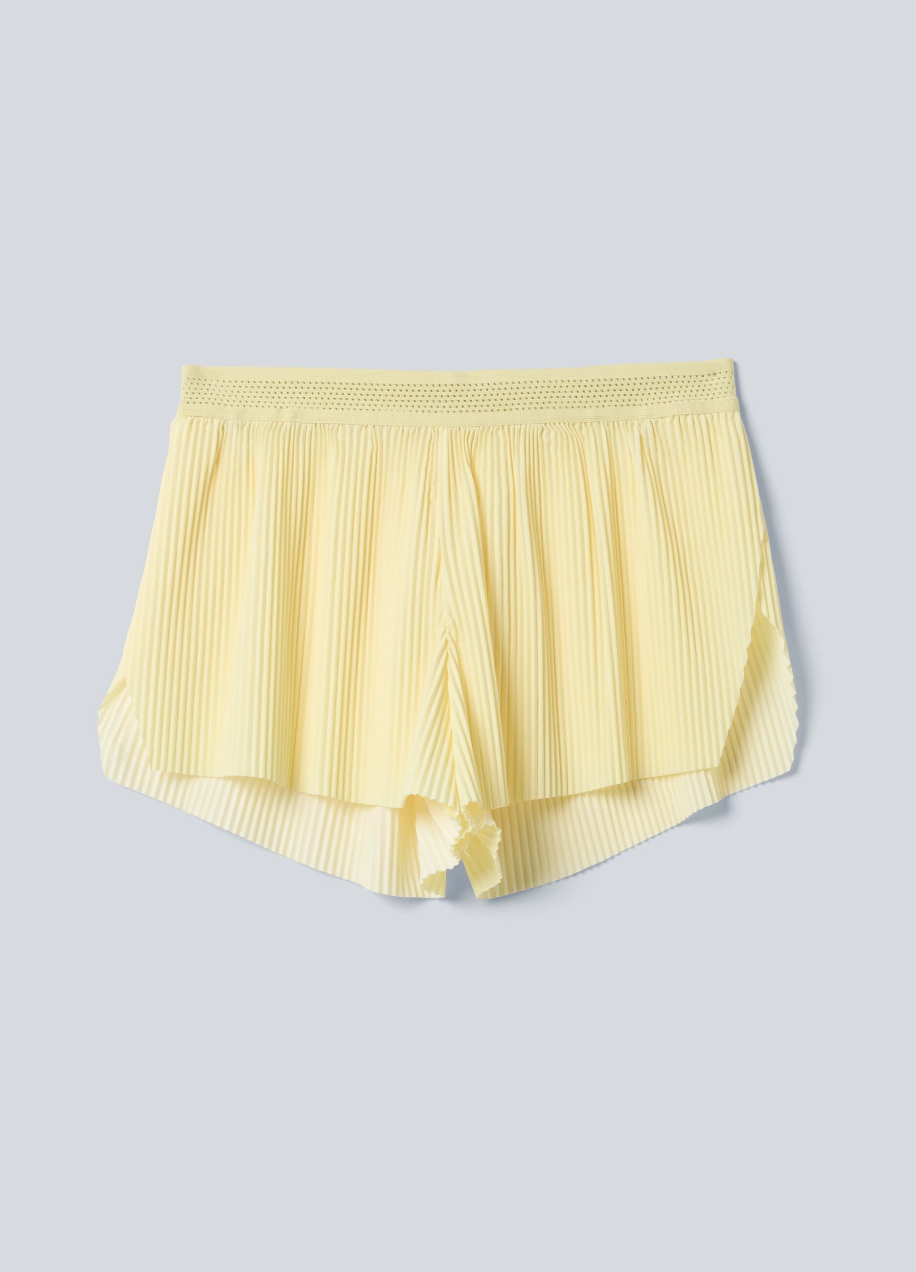 ALTAVIA COURT yellow pleated sports shorts in stretch fabric with removable inner short