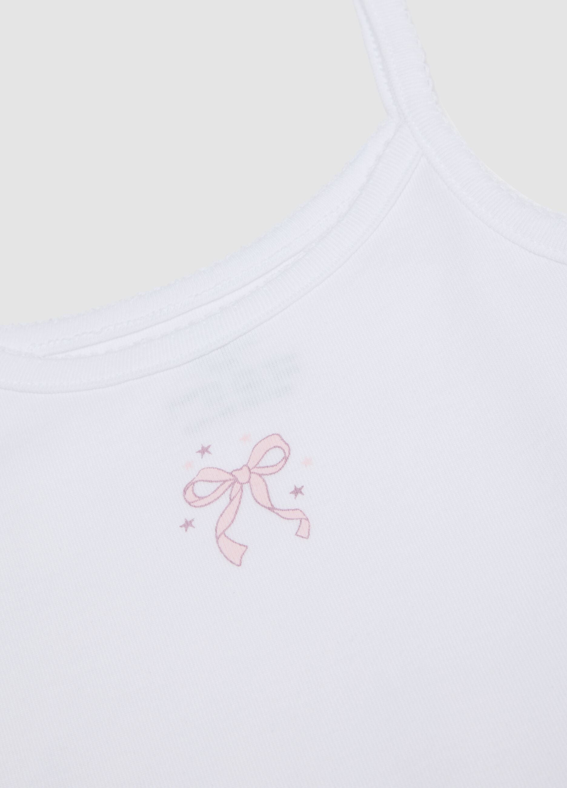 2-pack of white and pink organic cotton vests for girls