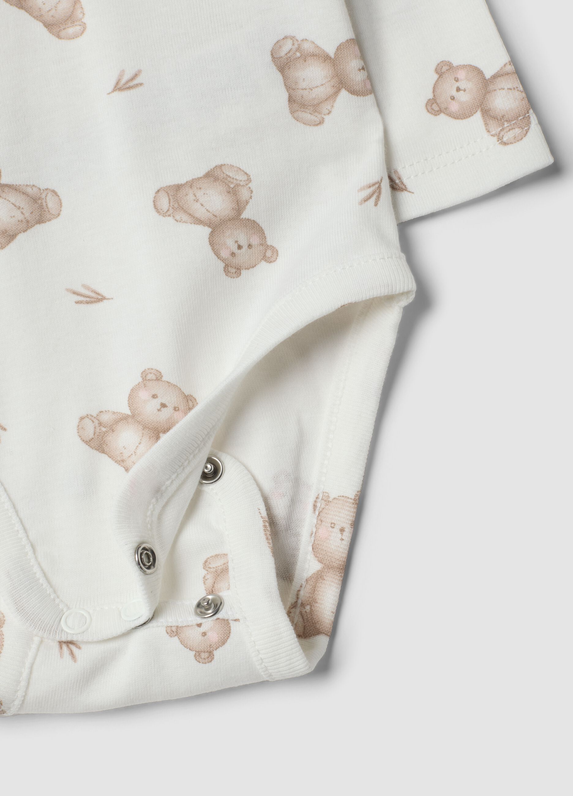 White organic cotton set with printed bodysuit and leggings for babies