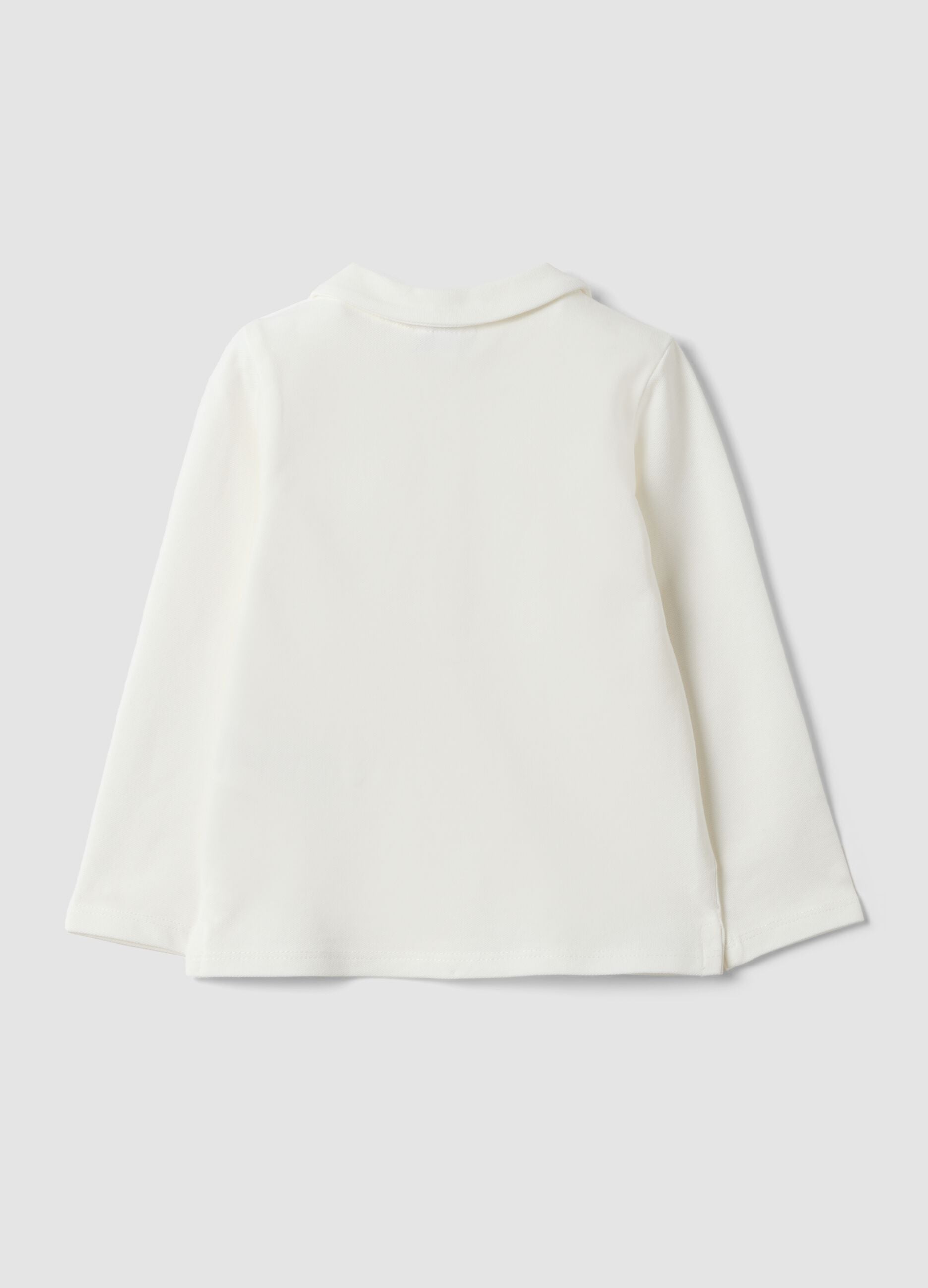 White stretch organic cotton polo shirt with ruffle detailing for baby girl