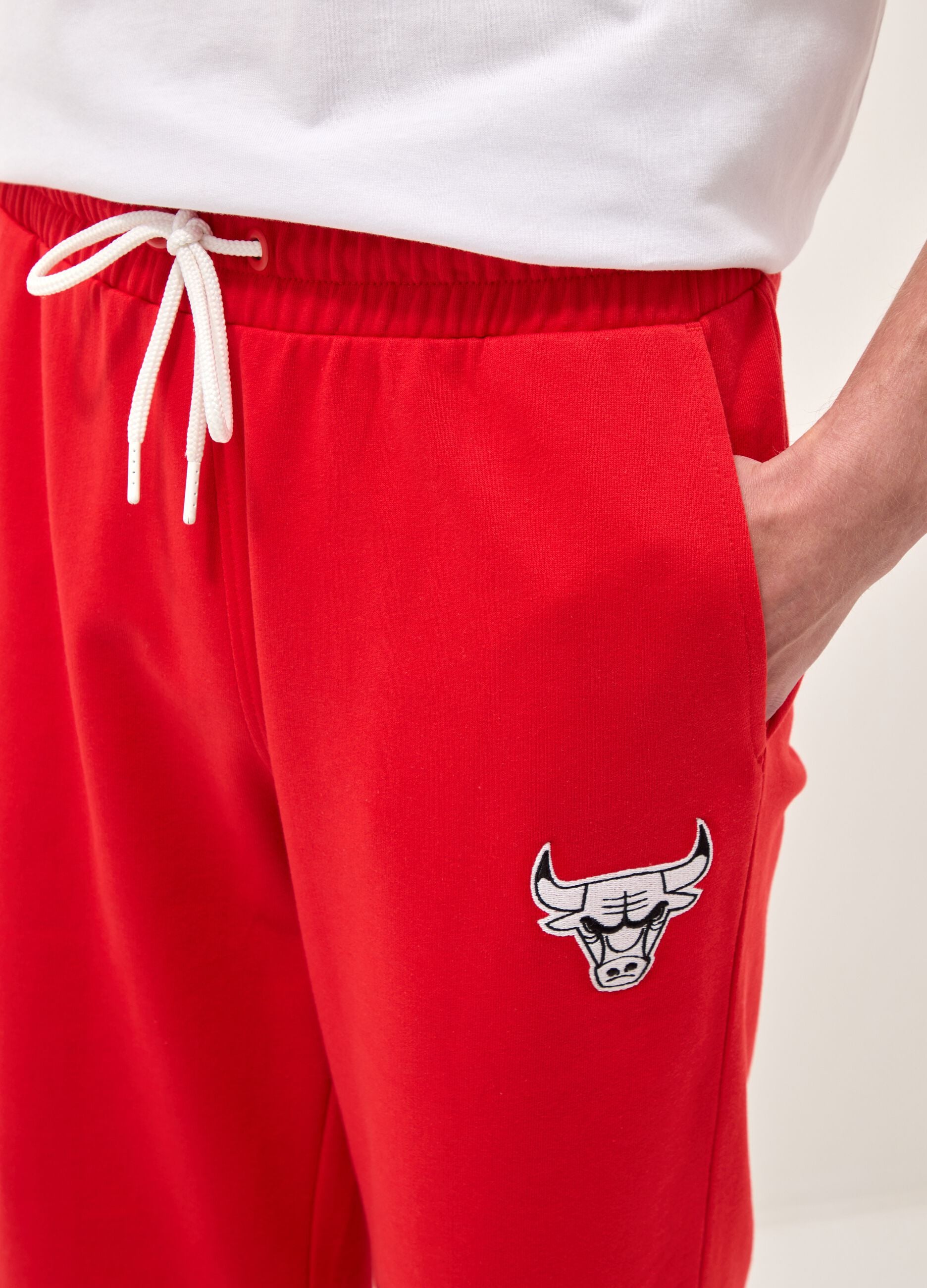 Red cotton-blend sports shorts with Chicago Bulls logo