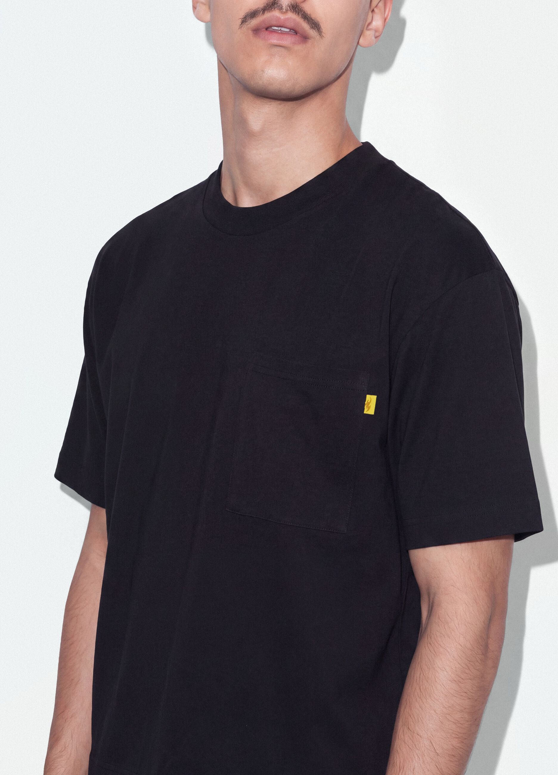 Black pure cotton crew-neck T-shirt with chest pocket, boxy fit