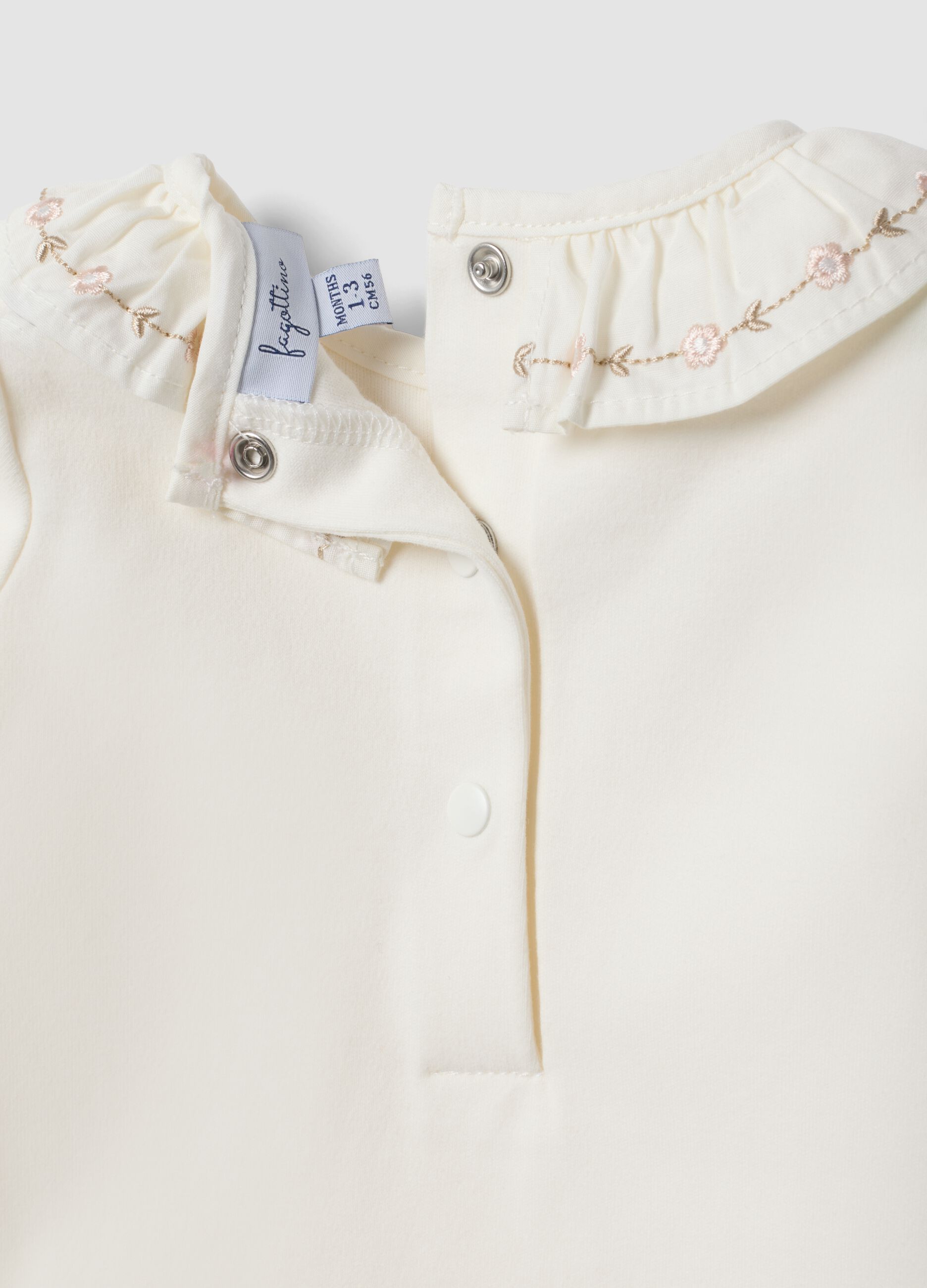 White organic cotton baby girl bodysuit with embroidered collar