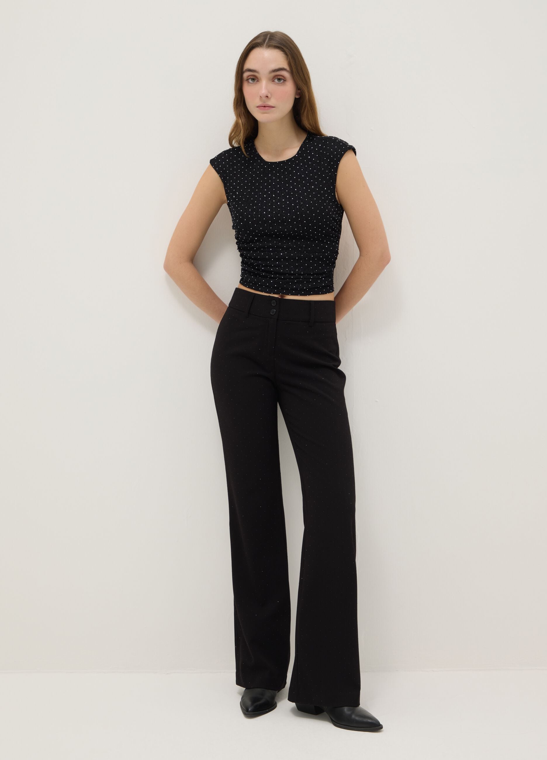 Black sleeveless top regular fit with back open and rhinestones
