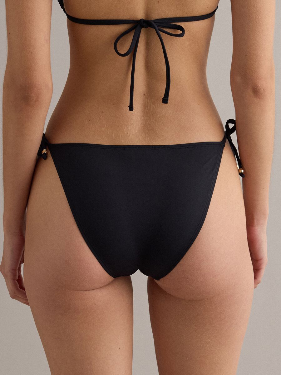 Black stretch bikini bottoms with side ties_2