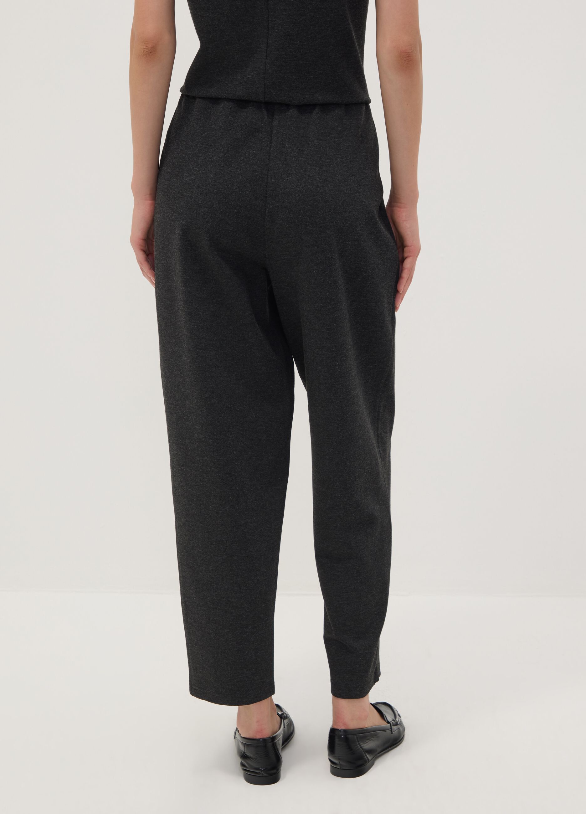 Black Milano-knit jogger trousers in stretch viscose, barrel fit