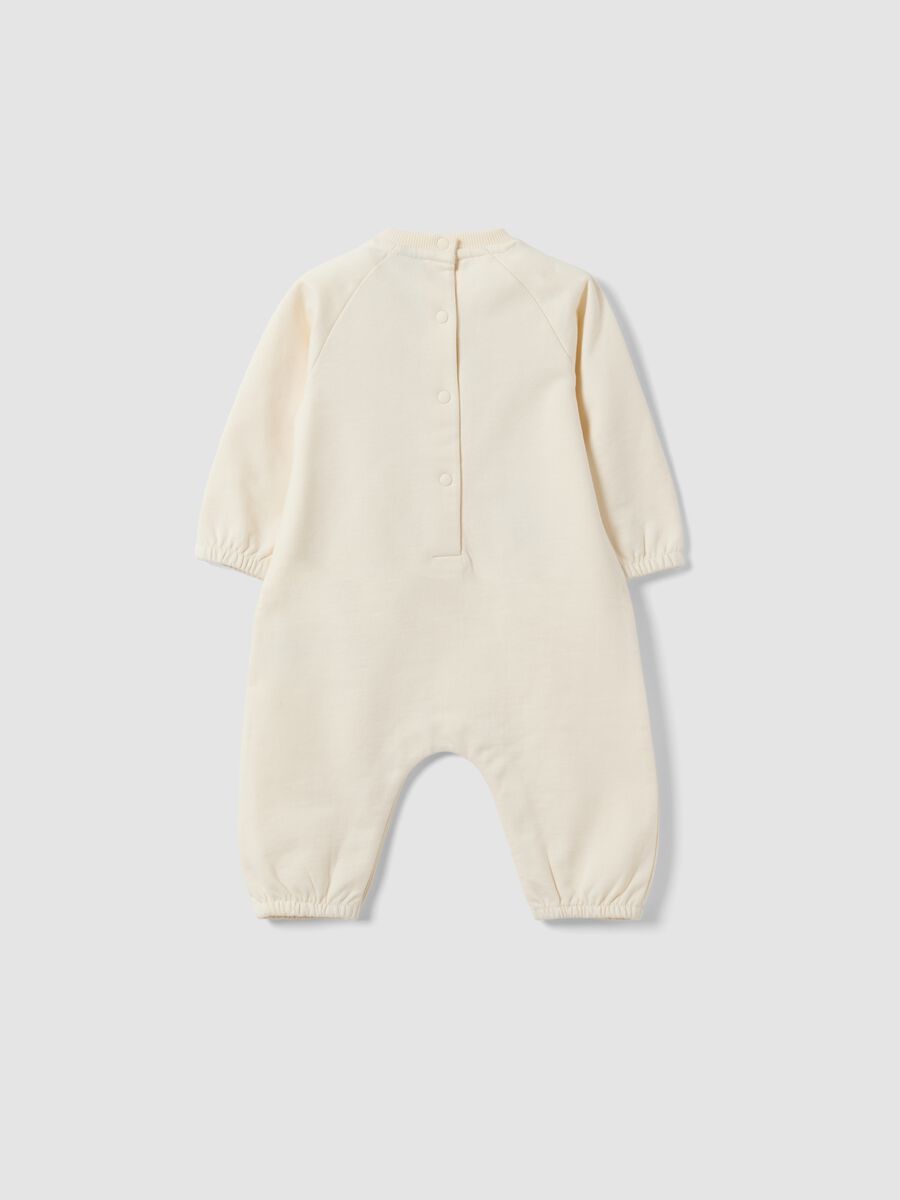 White organic cotton baby sleepsuit with Stitch print_1
