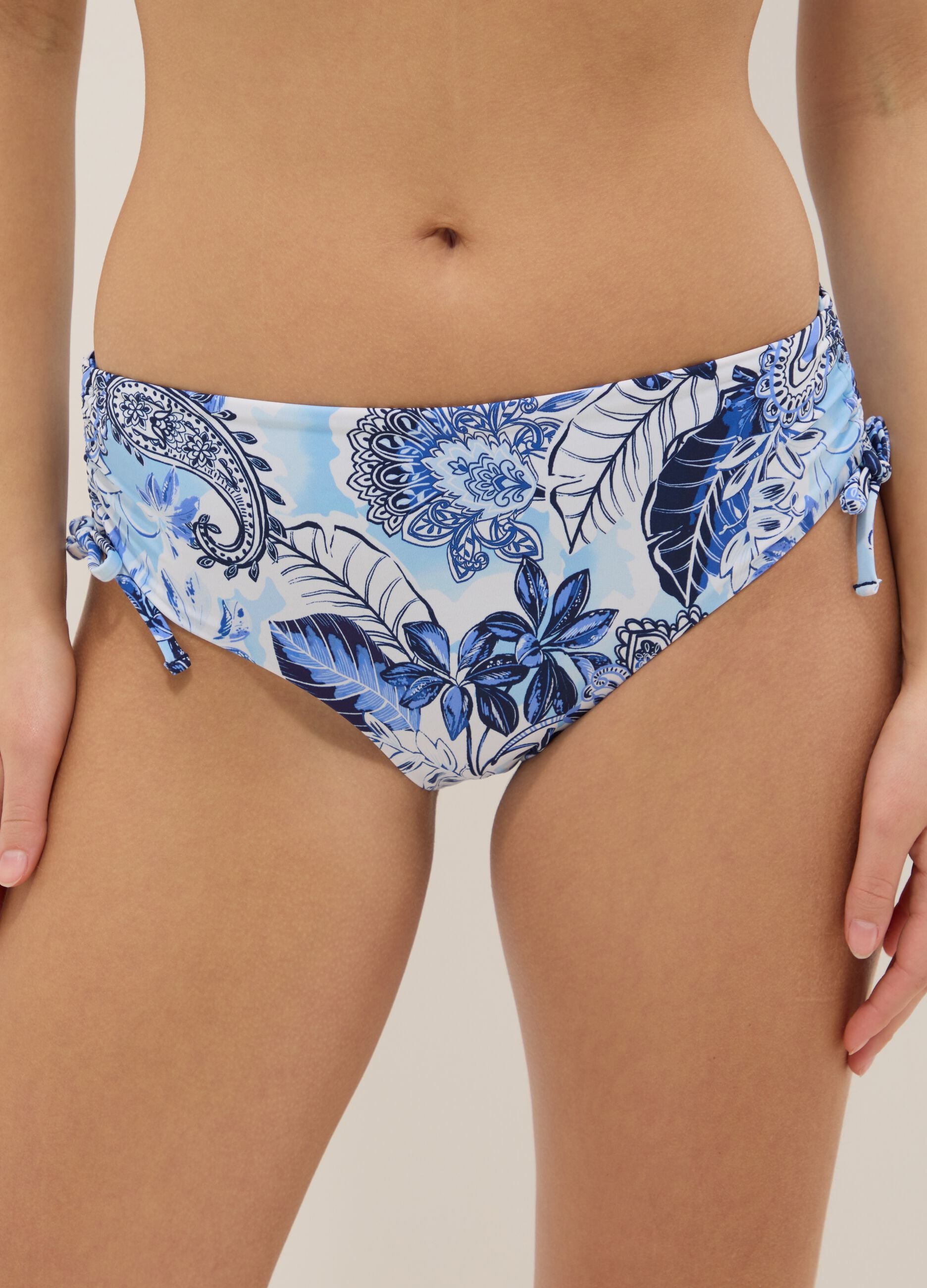 Blue bikini bottoms in stretch fabric with side ties