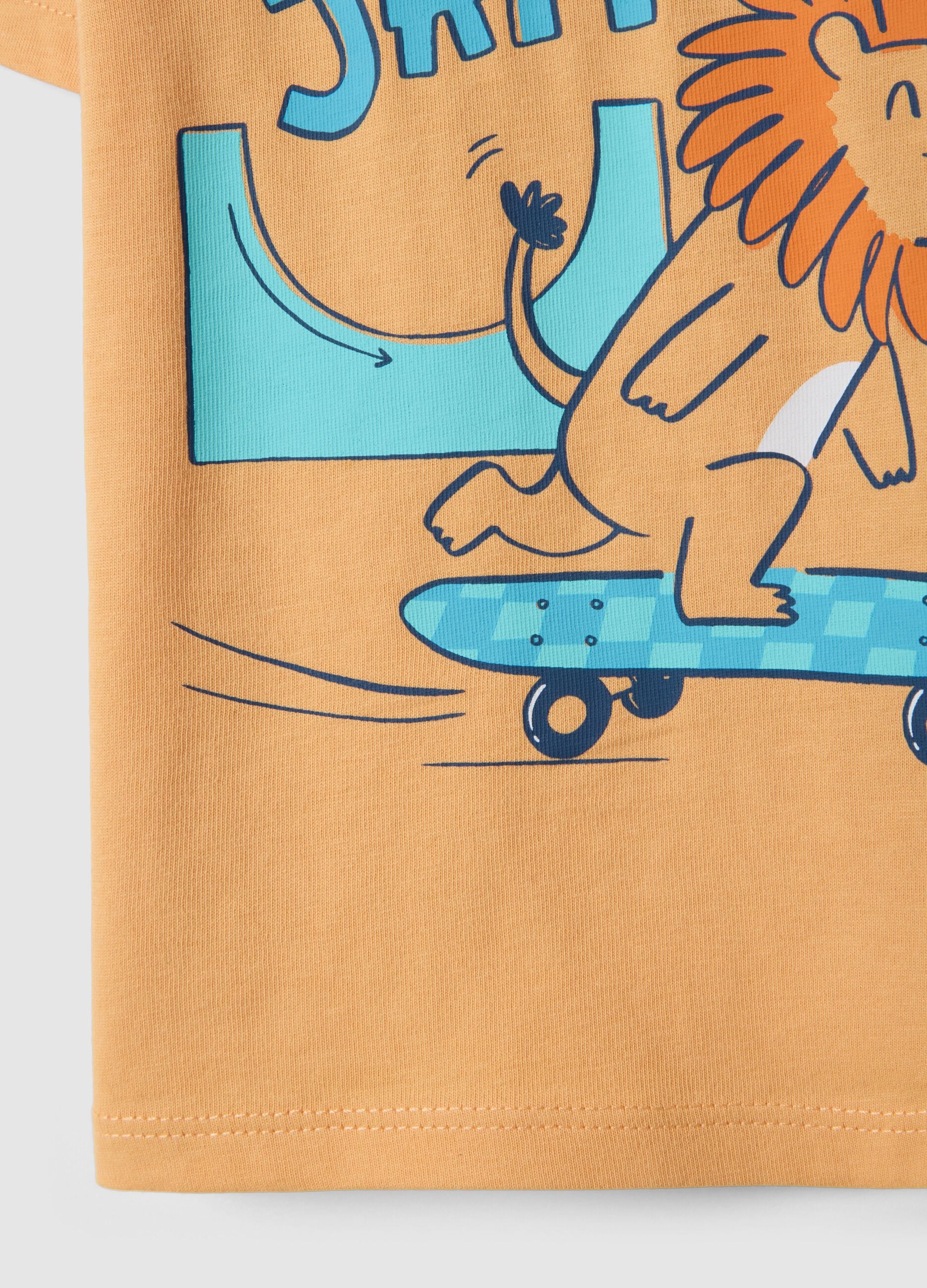 Orange pure cotton child's T-shirt with skater print, regular fit