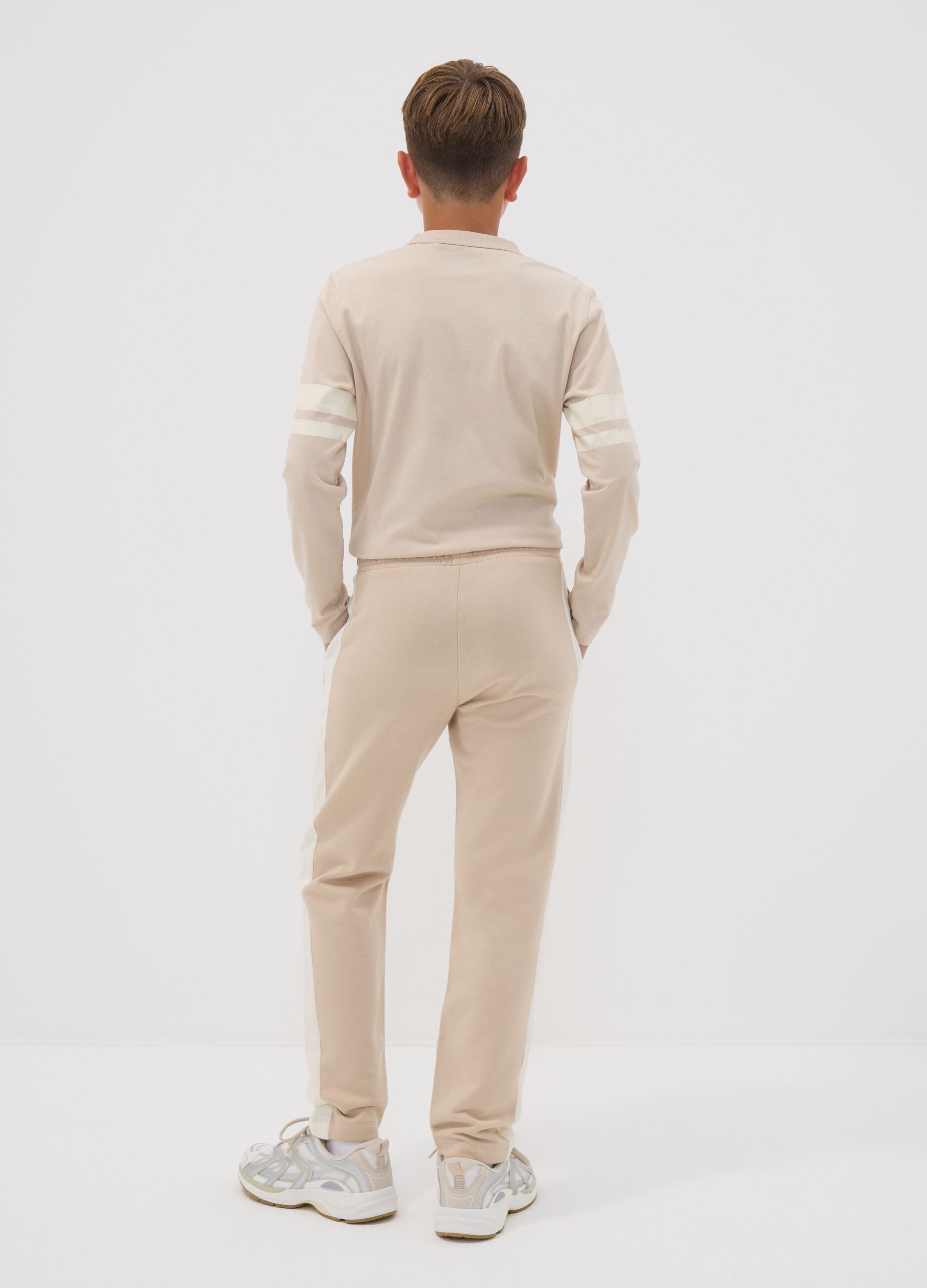 Beige pure cotton jogger trousers with side stripes for boys