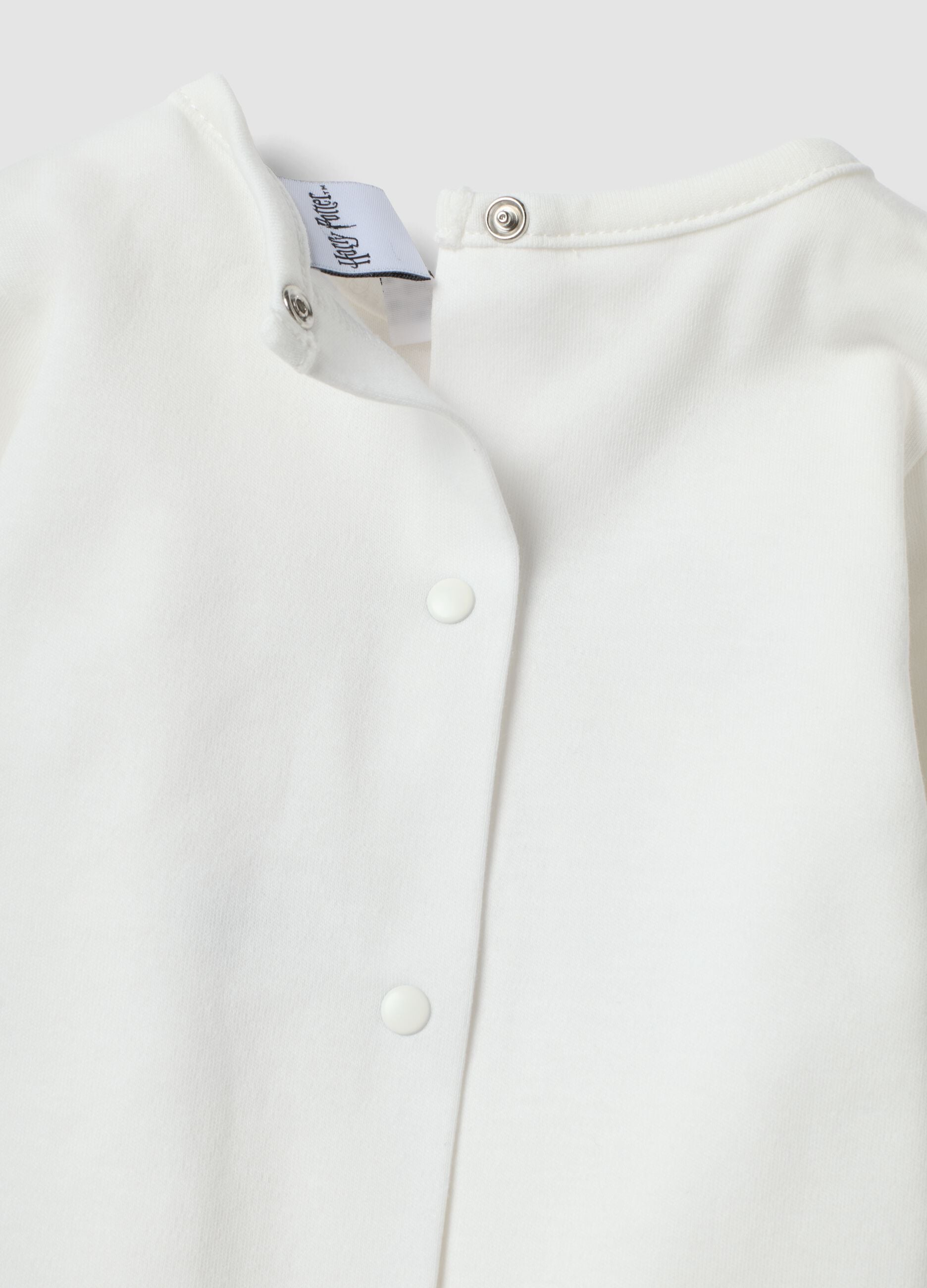 White baby top in pure organic cotton with Harry Potter embroidery