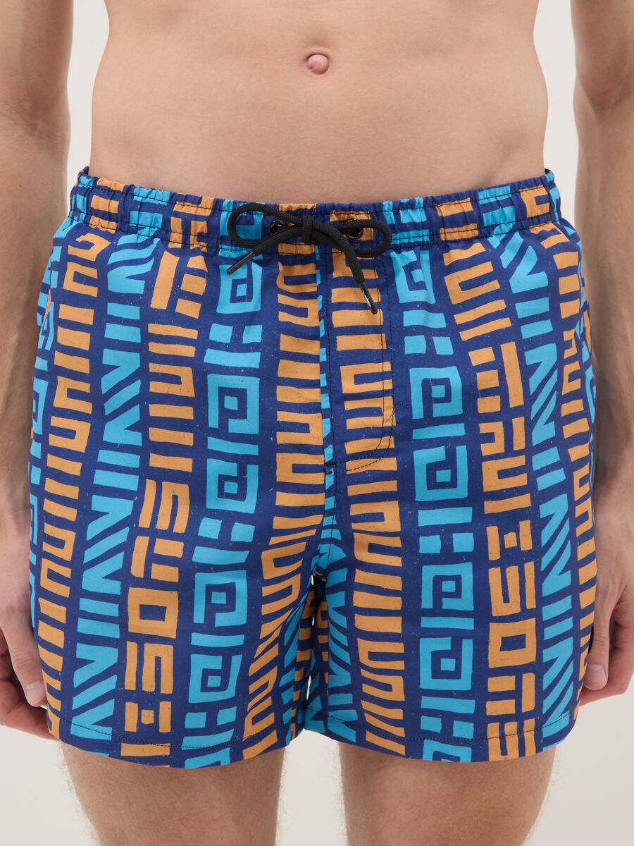 Multicolour geometric print swim shorts_1