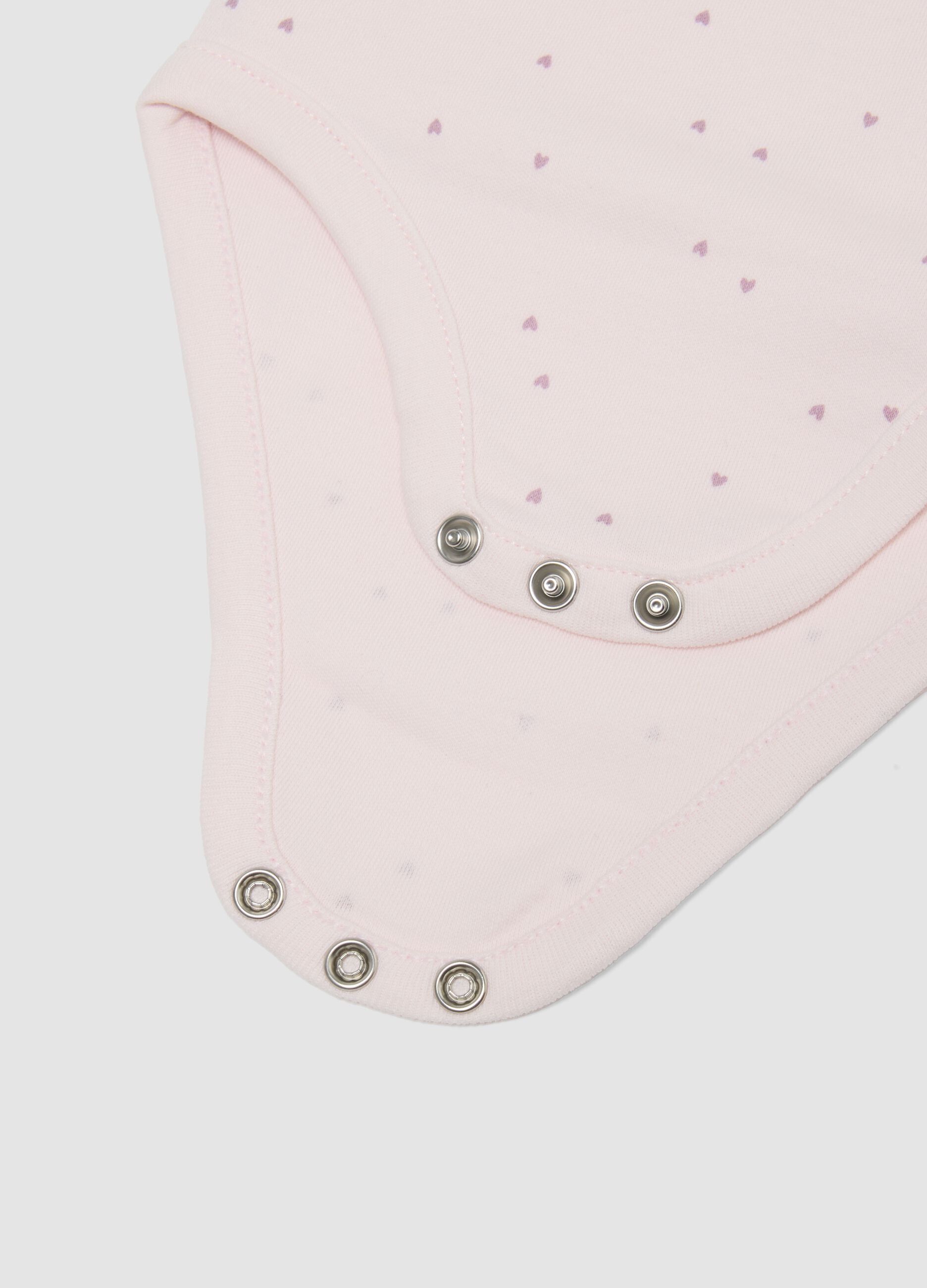 Two-pack of pink and white organic cotton short-sleeve bodysuits for baby girls