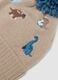 Beige hat with pom‑pom and dinosaurs_2