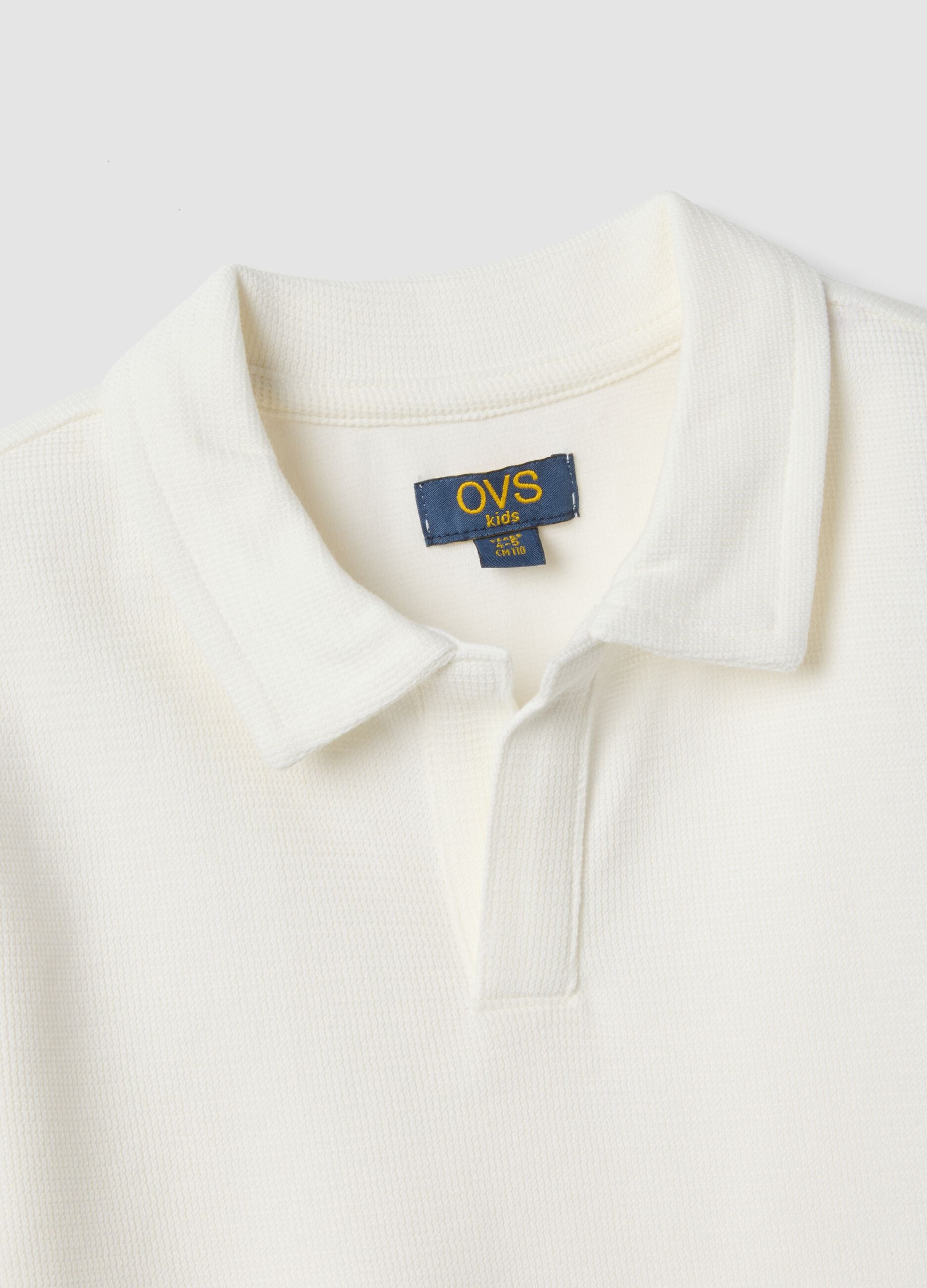 Polo bianca in cotone elasticizzato per bambino