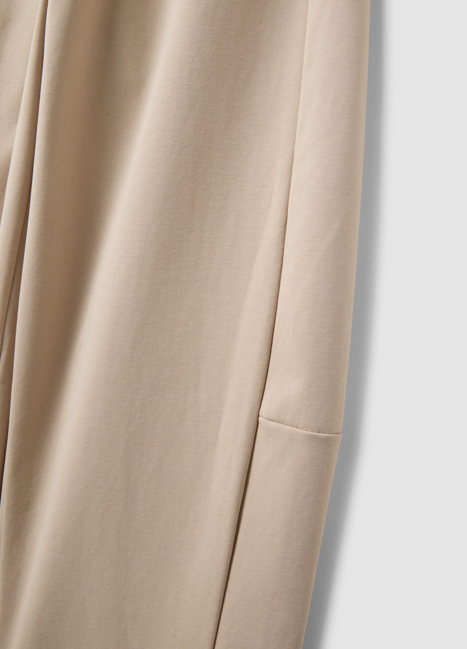 Beige wide-leg trousers in stretch cotton
