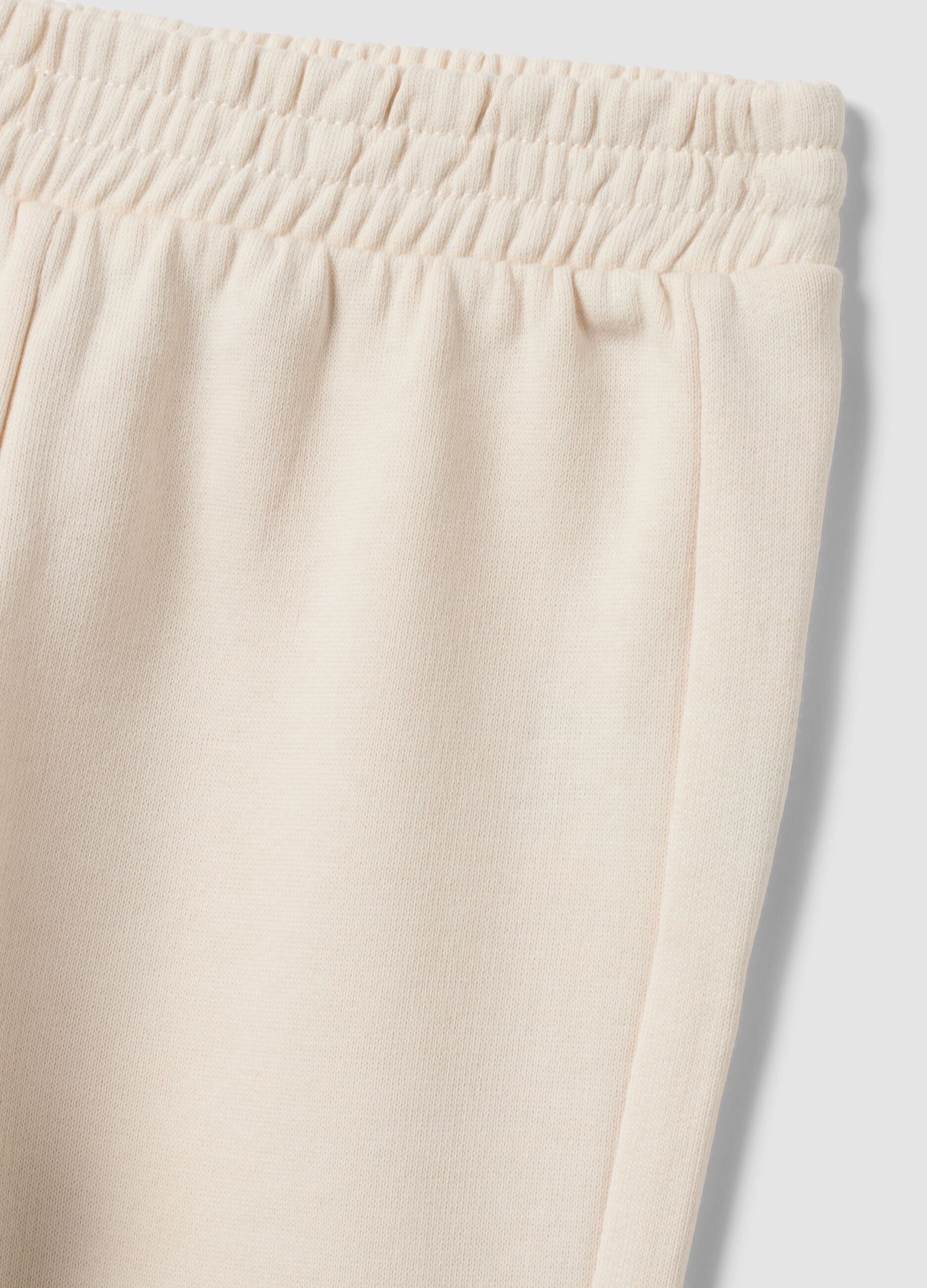 White pure cotton jogger trousers for baby girl