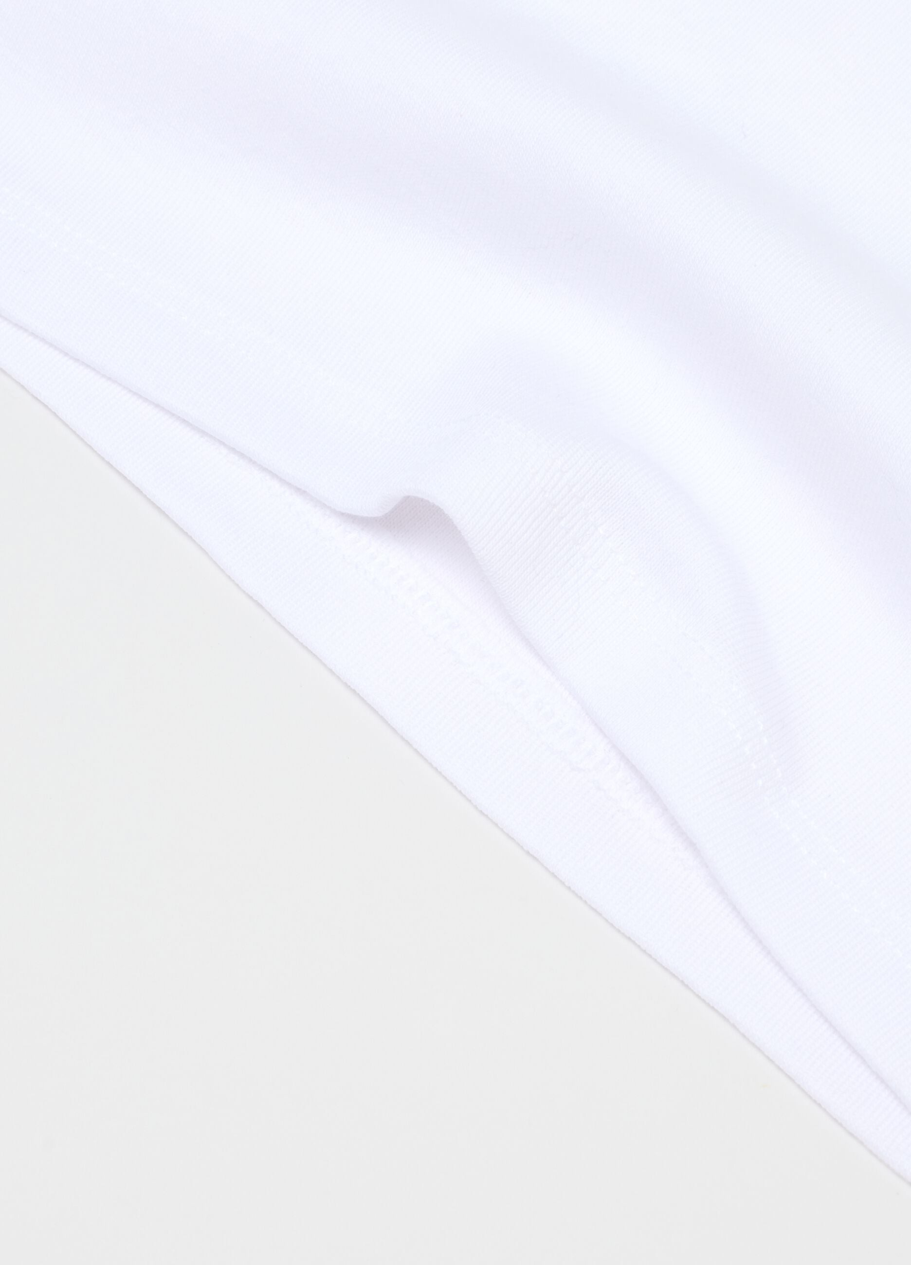 Pack of two boys' white cotton vests with a regular fit