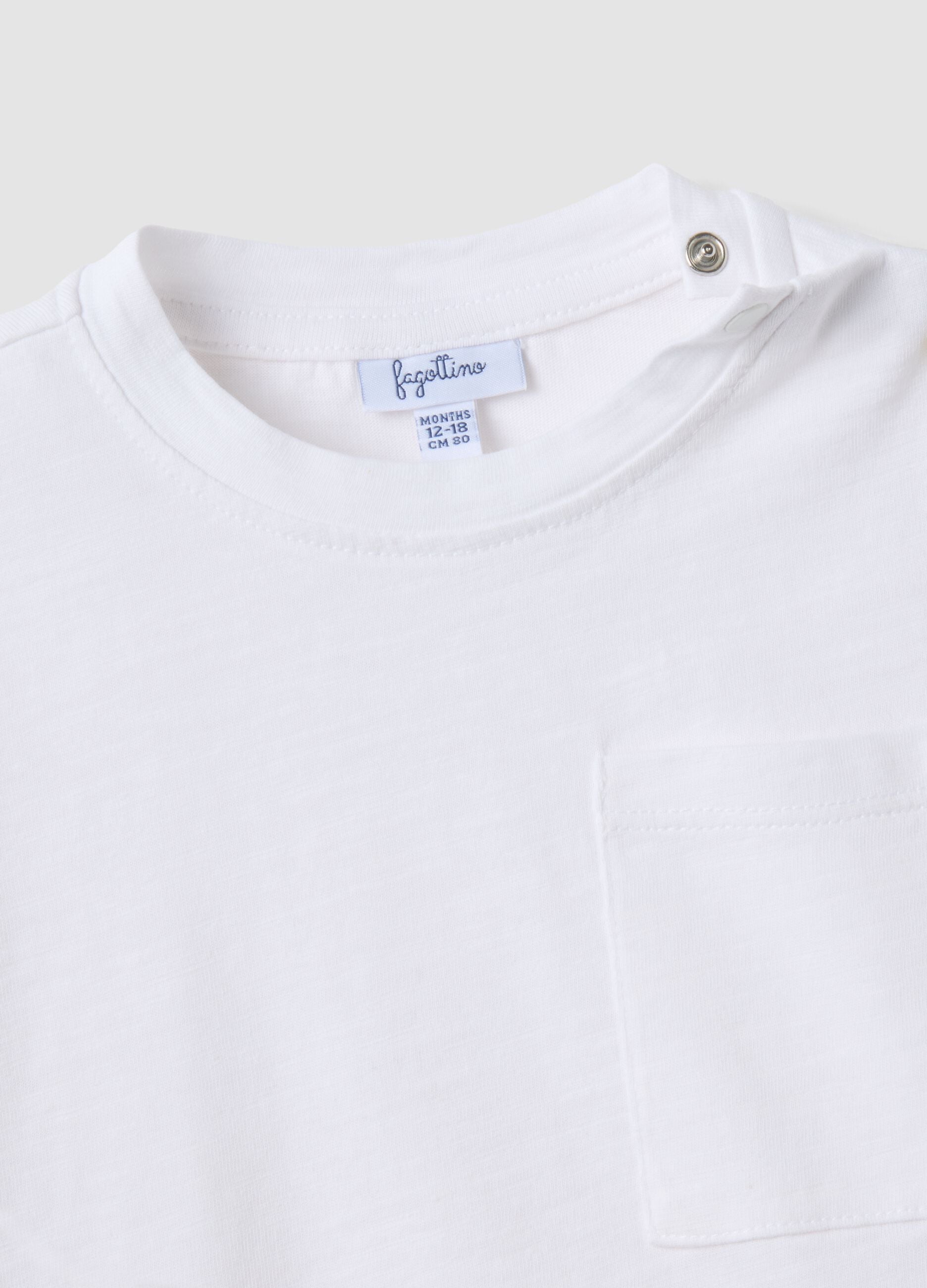 White oversized pure organic cotton T-shirt with chest pocket for boys
