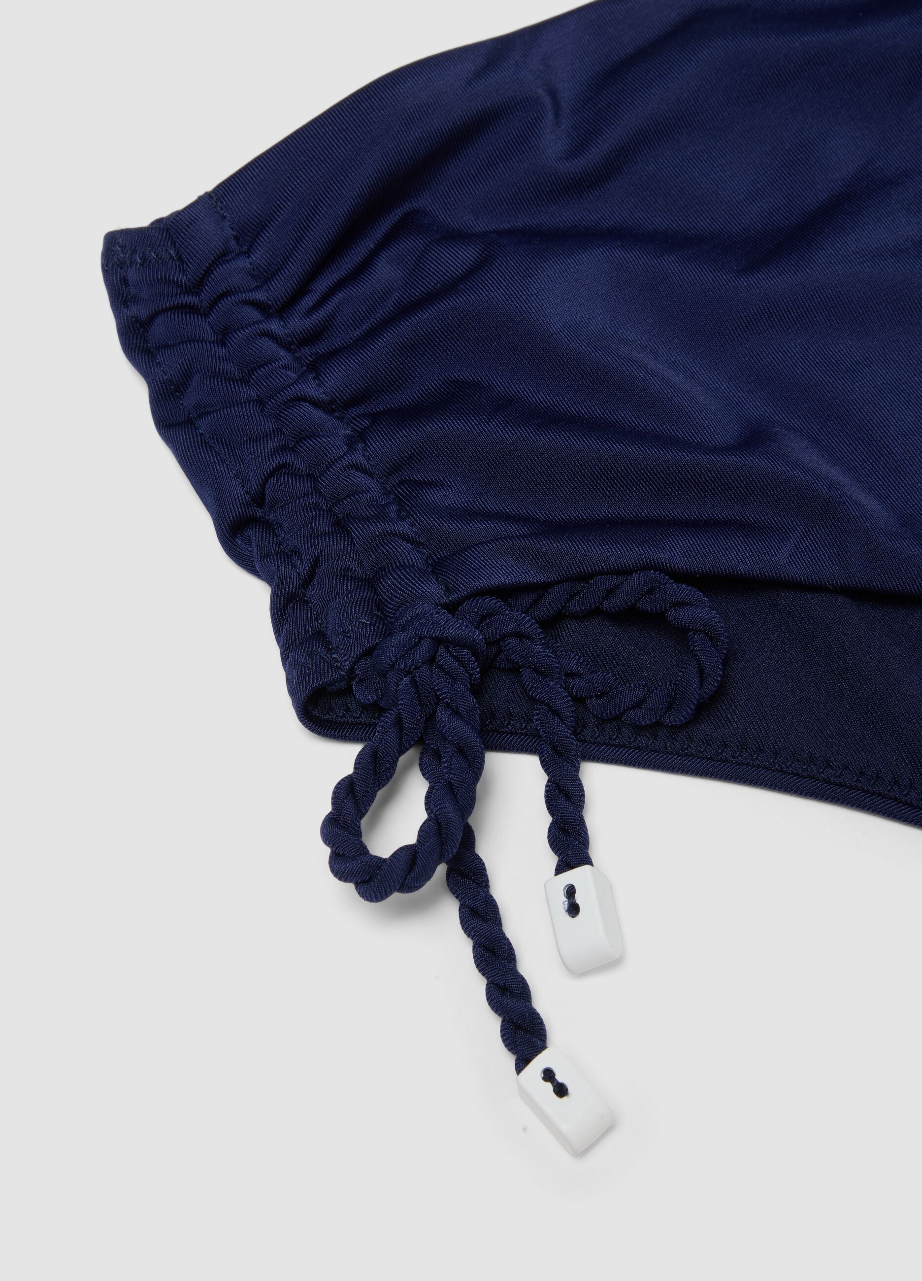 Blue bikini bottoms in stretch fabric with side ties