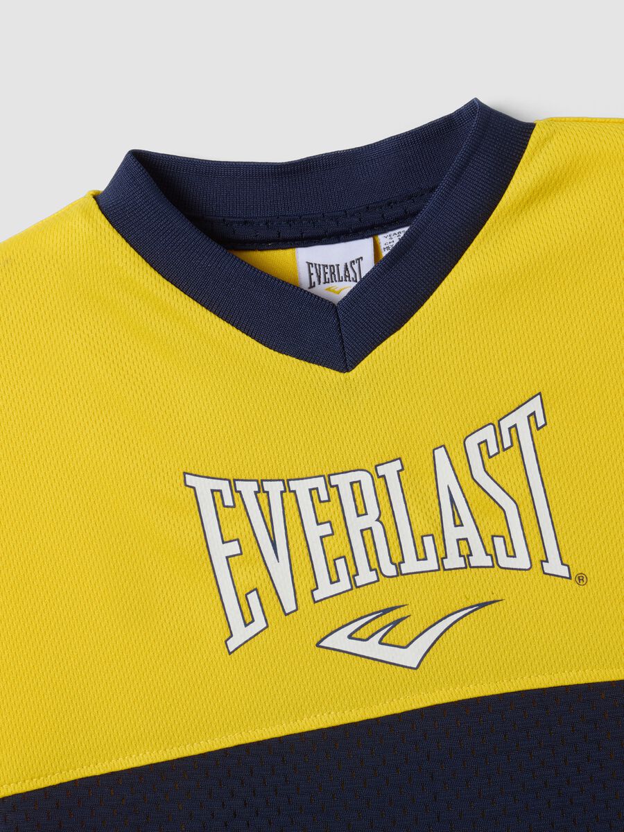 T-shirt gialla e blu regular fit con inserto traforato regular fit per bambino_3