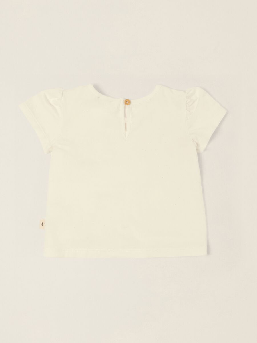T-shirt bianca in cotone elasticizzato con fiori ricamati da neonata_2