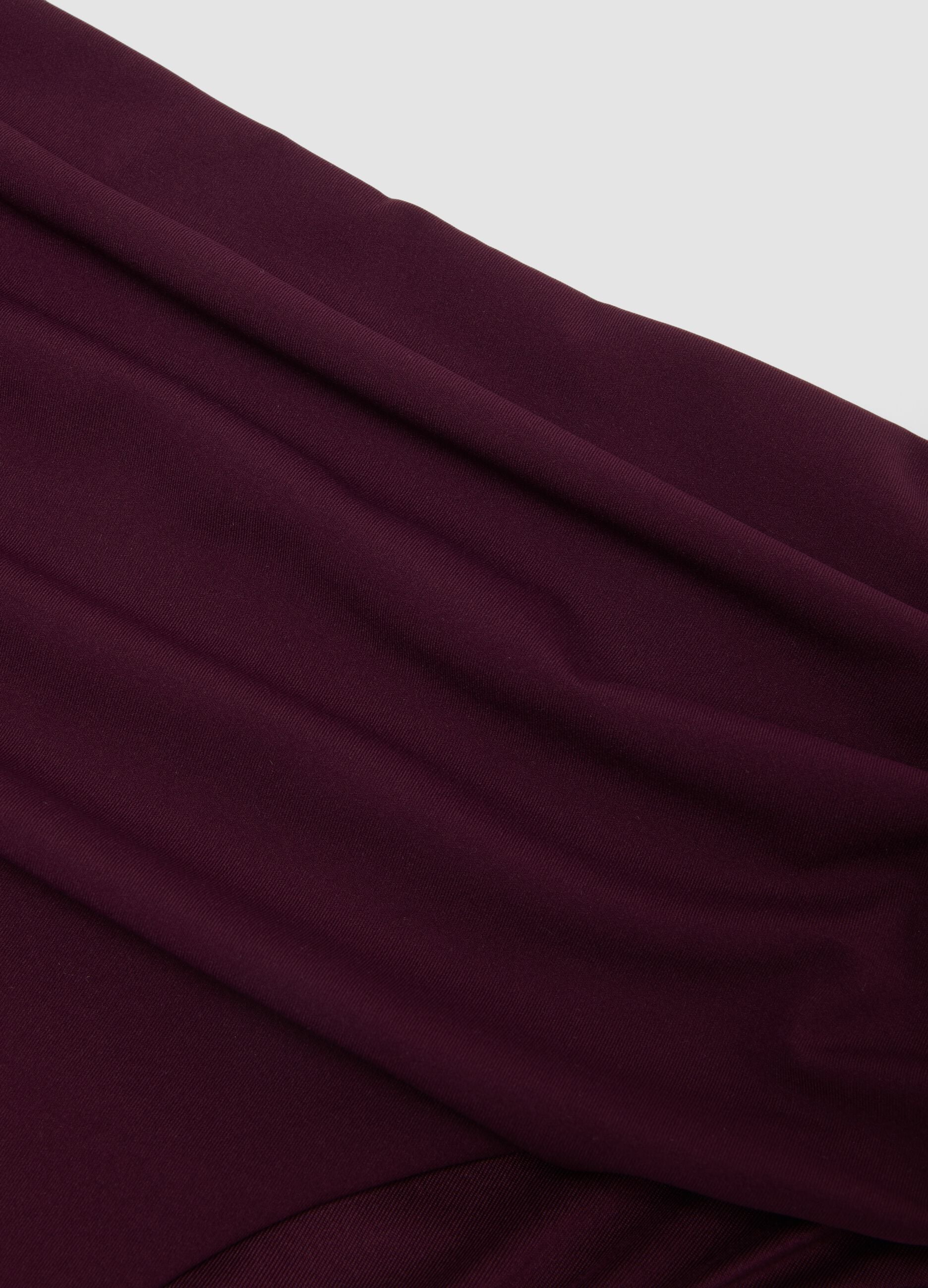 Purple high-waist stretch bikini bottoms with shaping effect
