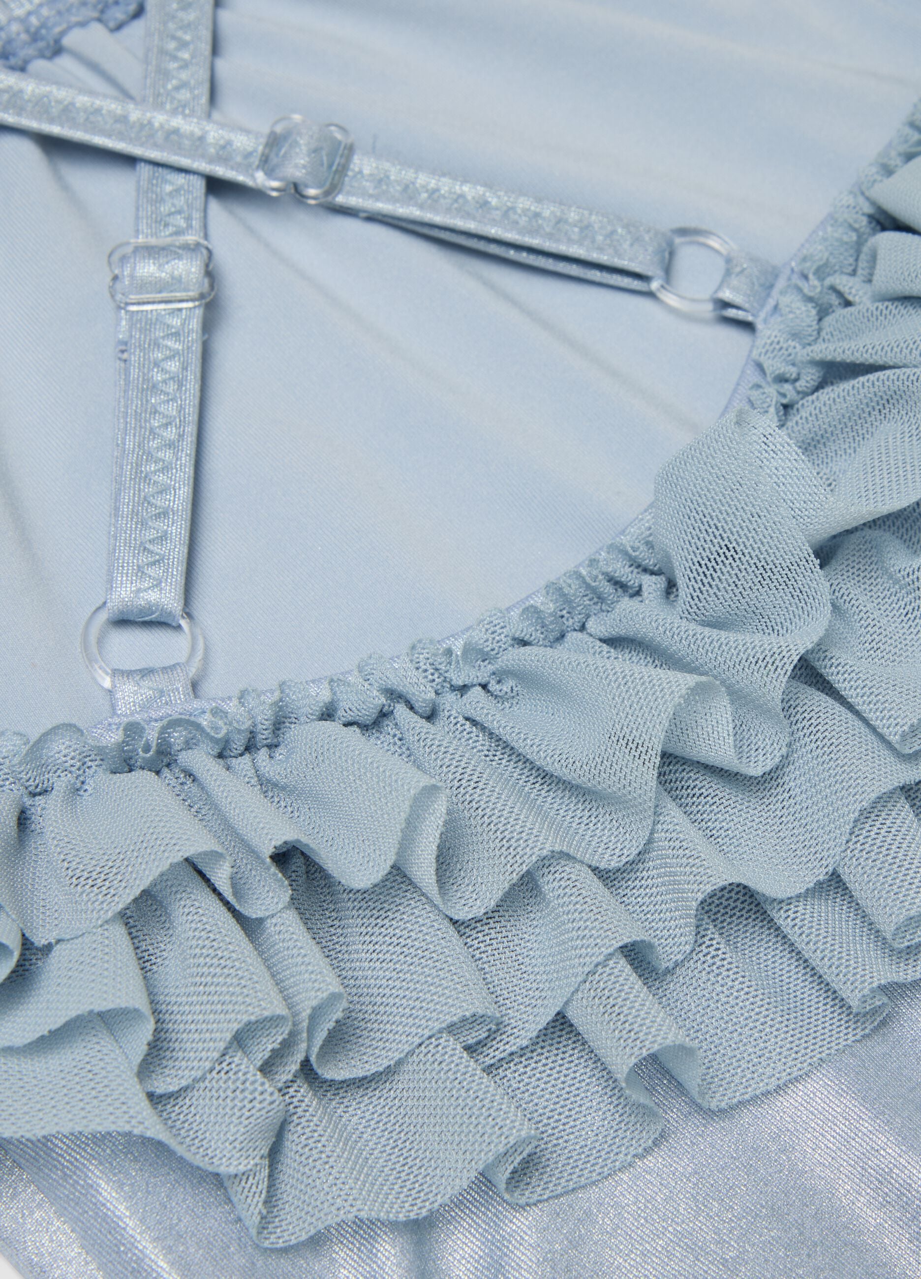 Light blue stretch swimsuit with ruffle detail for baby girls