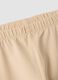 Beige stretch organic cotton leggings with bows for baby girl_3