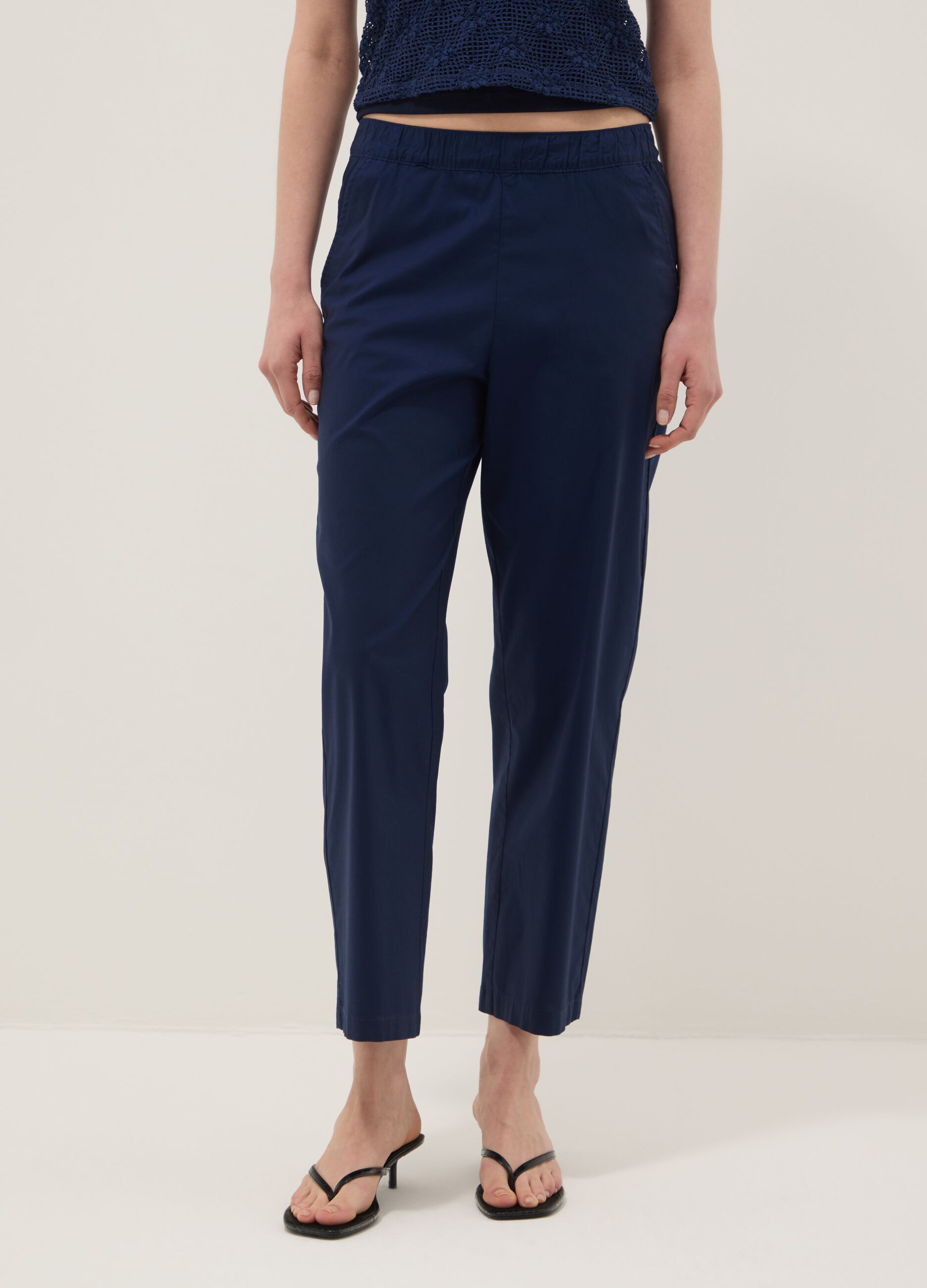 Blue stretch cotton trousers with elasticated waist