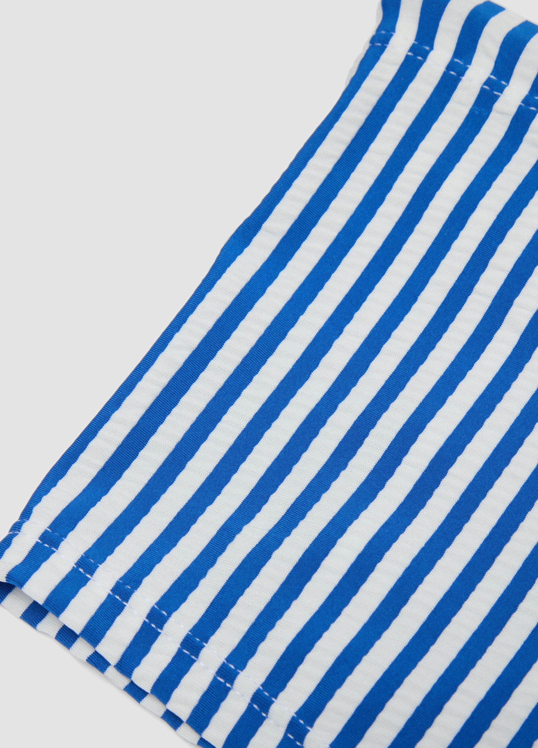 Blue and white stretch swim trunks
