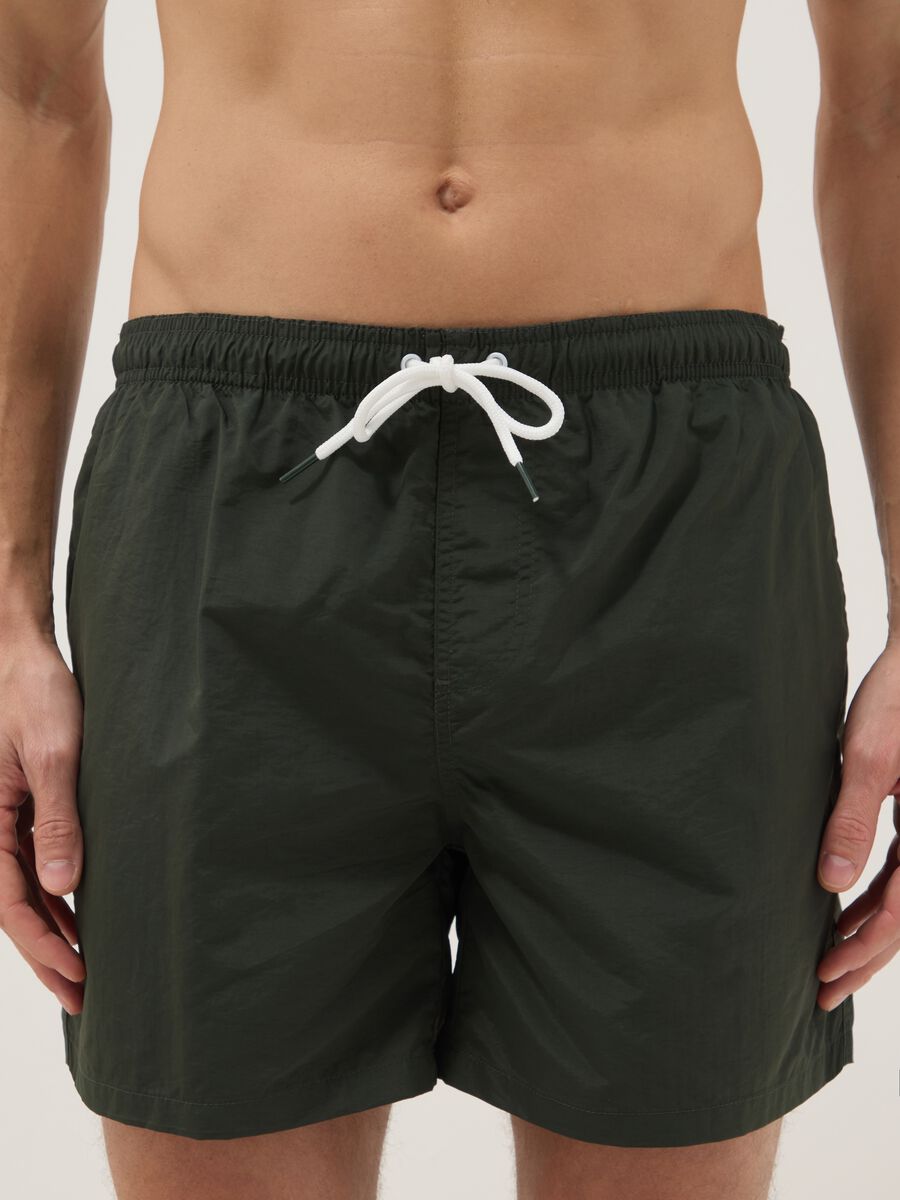 Green regular-fit swim shorts with drawstring_1